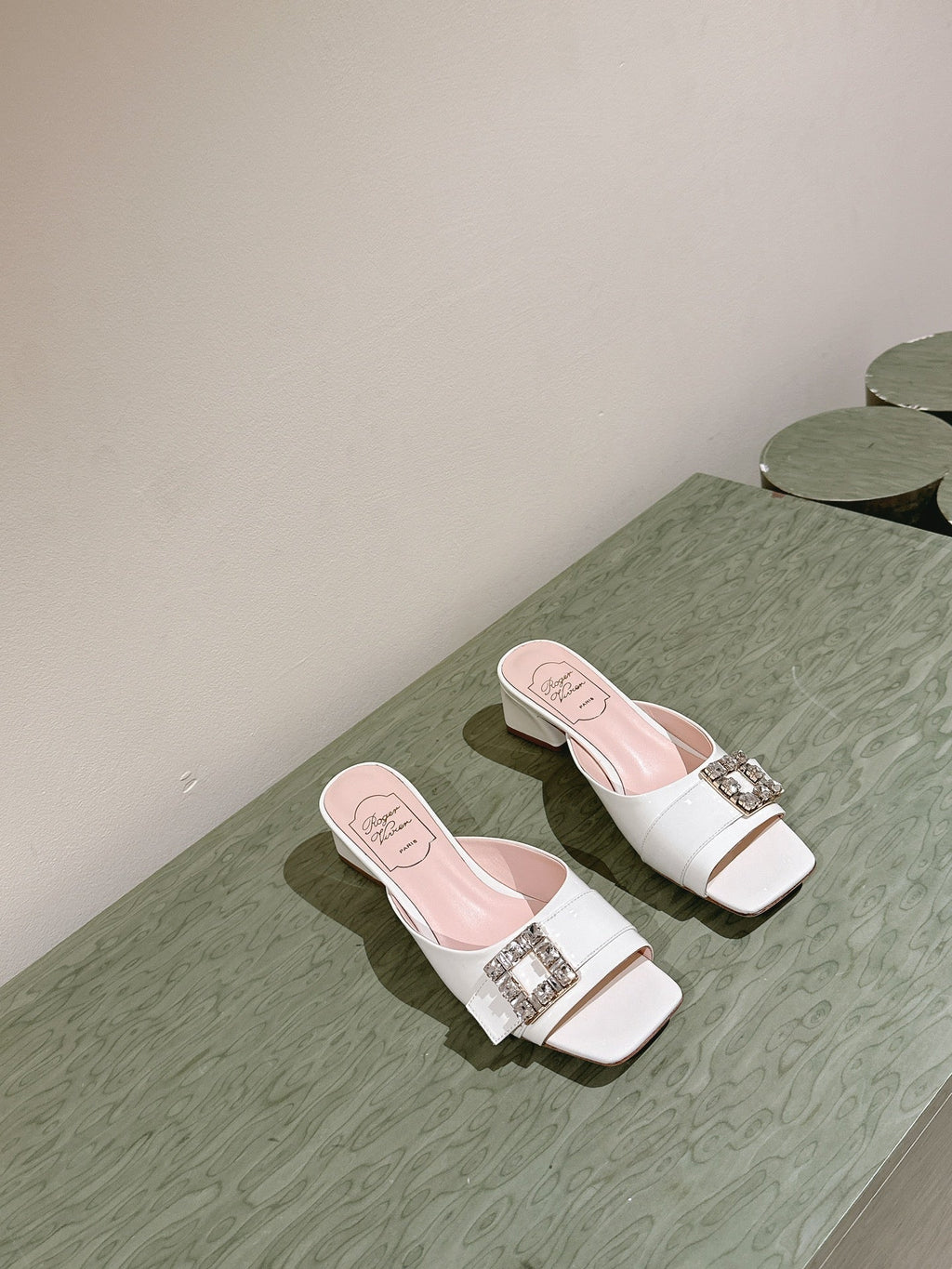 CRYSTAL HEEL MULE IN WHITE SHINY CALFSKIN WITH EMBELLISHED BUCKLE