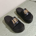 RISE SANDALS IN BLACK SHINY LAMBSKIN GOLD BUCKLE