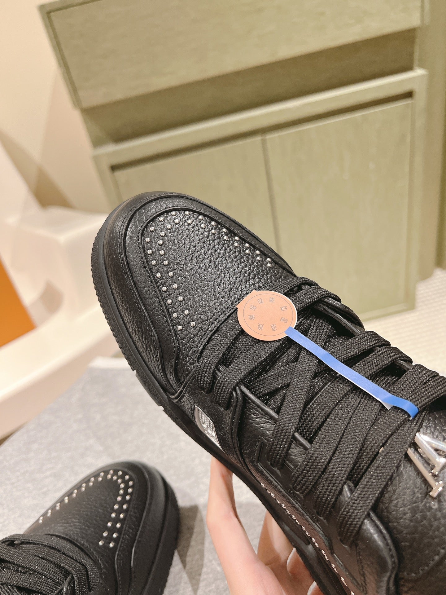 LV TRAINER SNEAKER IN BLACK CALFSKIN