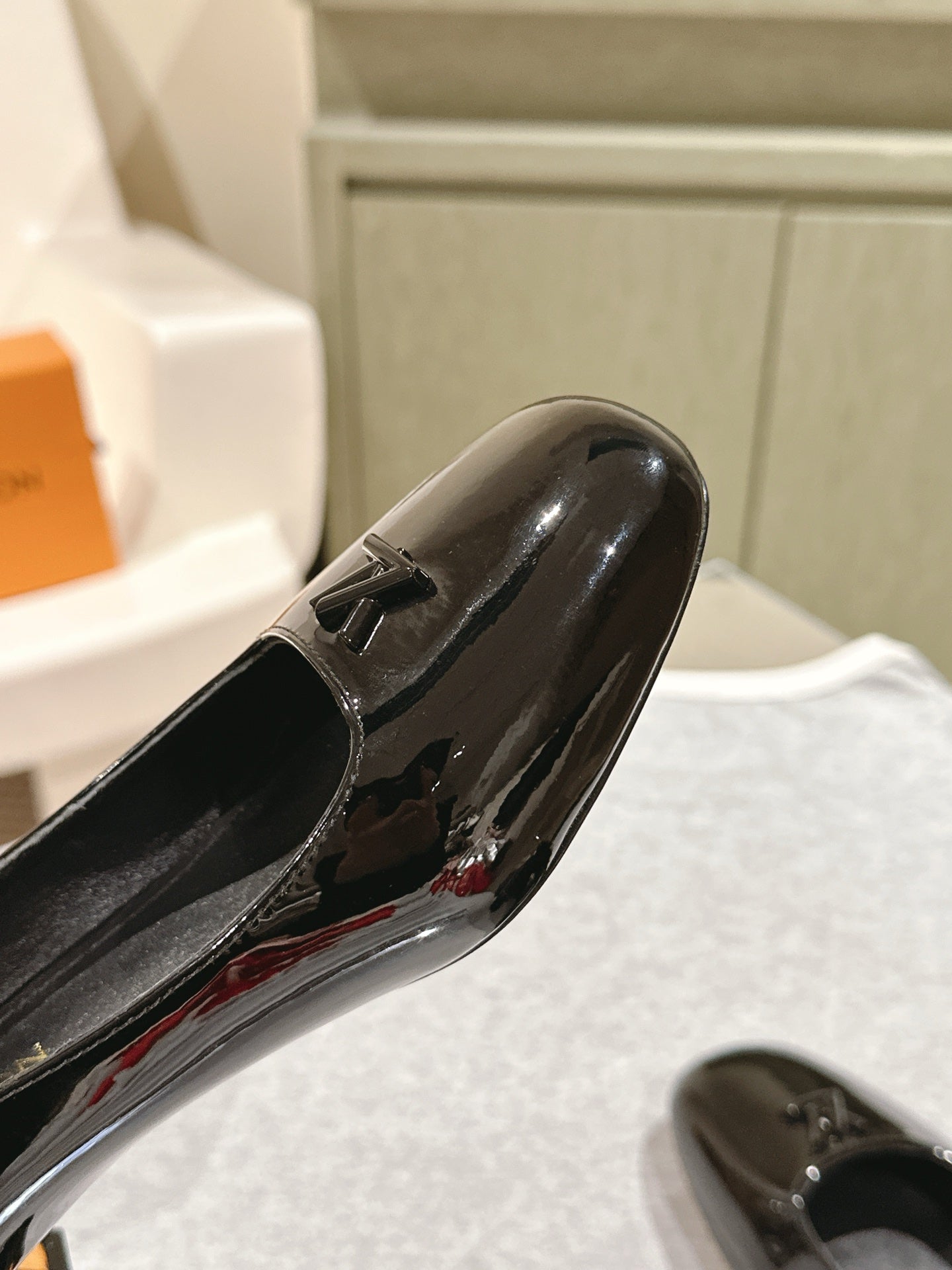 SWING HIGH PUMP 55 MM IN BLACK PATENT CALFSKIN