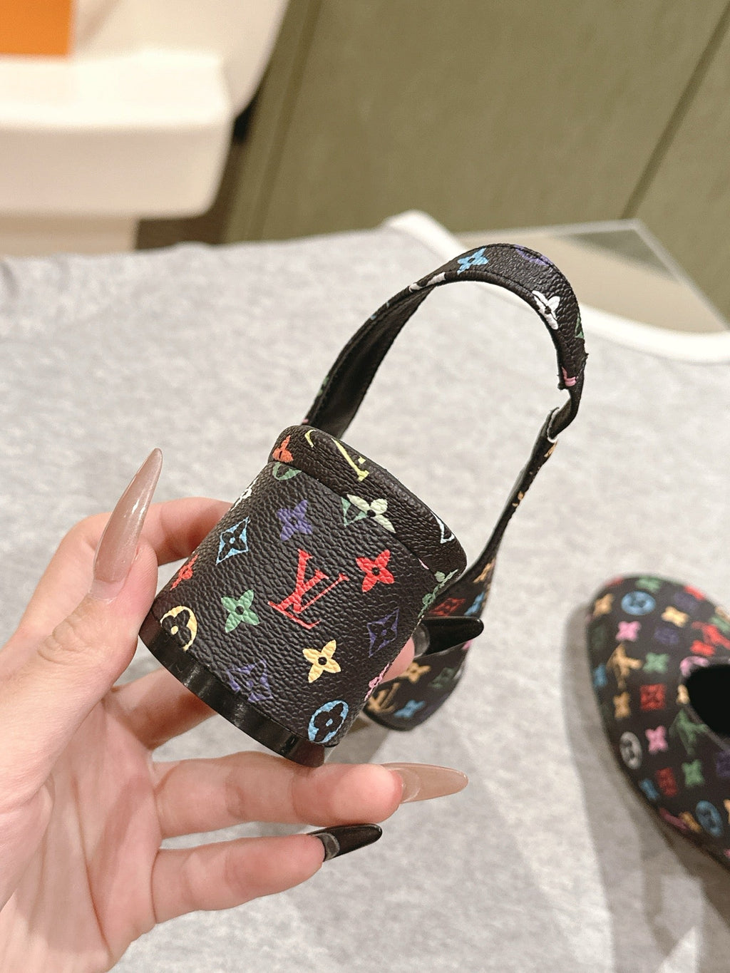 SWING SLINGBACK PUMP 55 MM IN BLACK MONOGRAM CALFSKIN