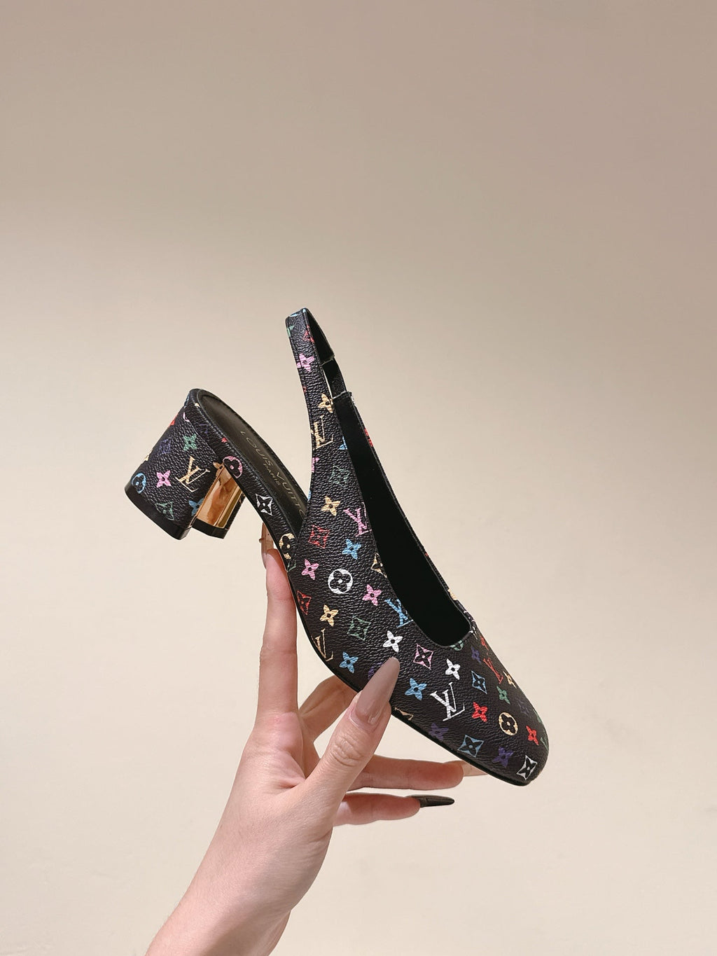 SWING SLINGBACK PUMP 55 MM IN BLACK MONOGRAM CALFSKIN