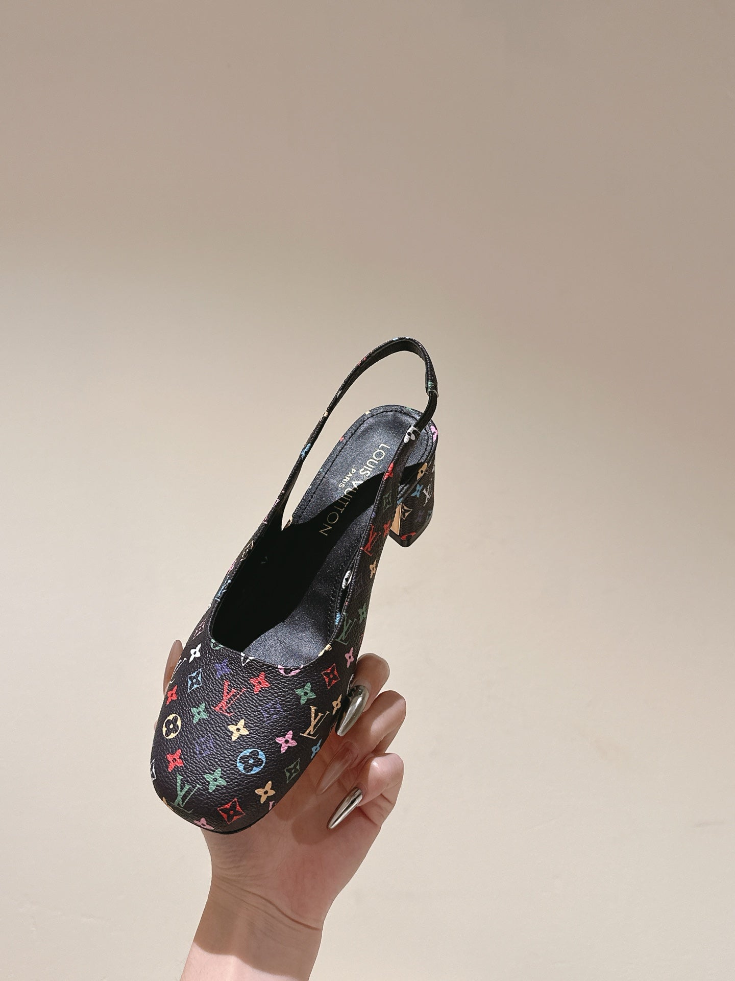 SWING SLINGBACK PUMP 55 MM IN BLACK MONOGRAM CALFSKIN