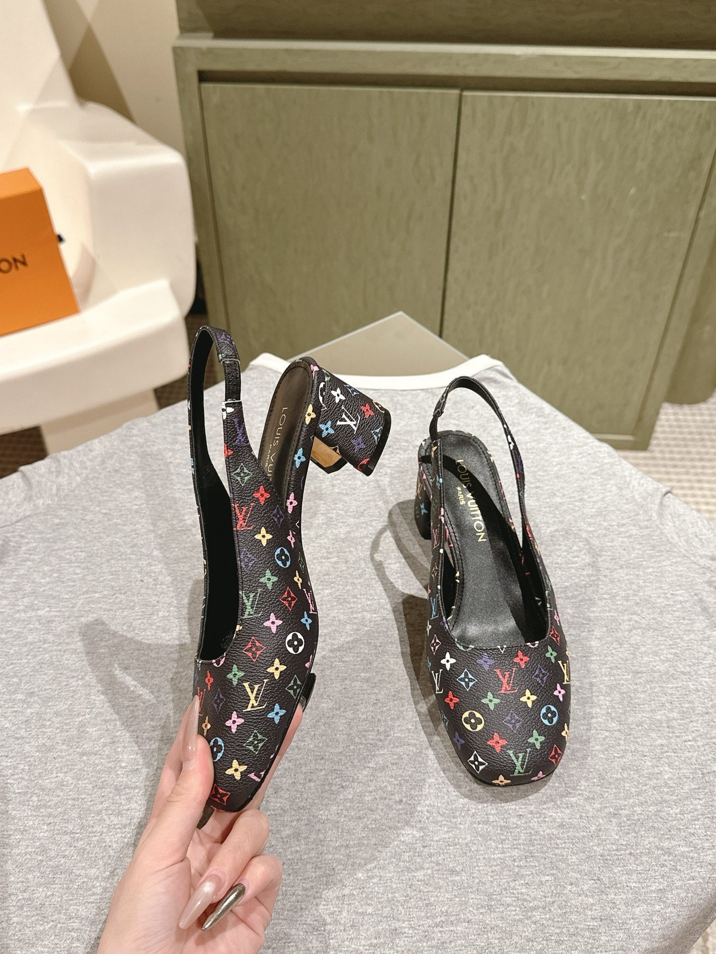 SWING SLINGBACK PUMP 55 MM IN BLACK MONOGRAM CALFSKIN