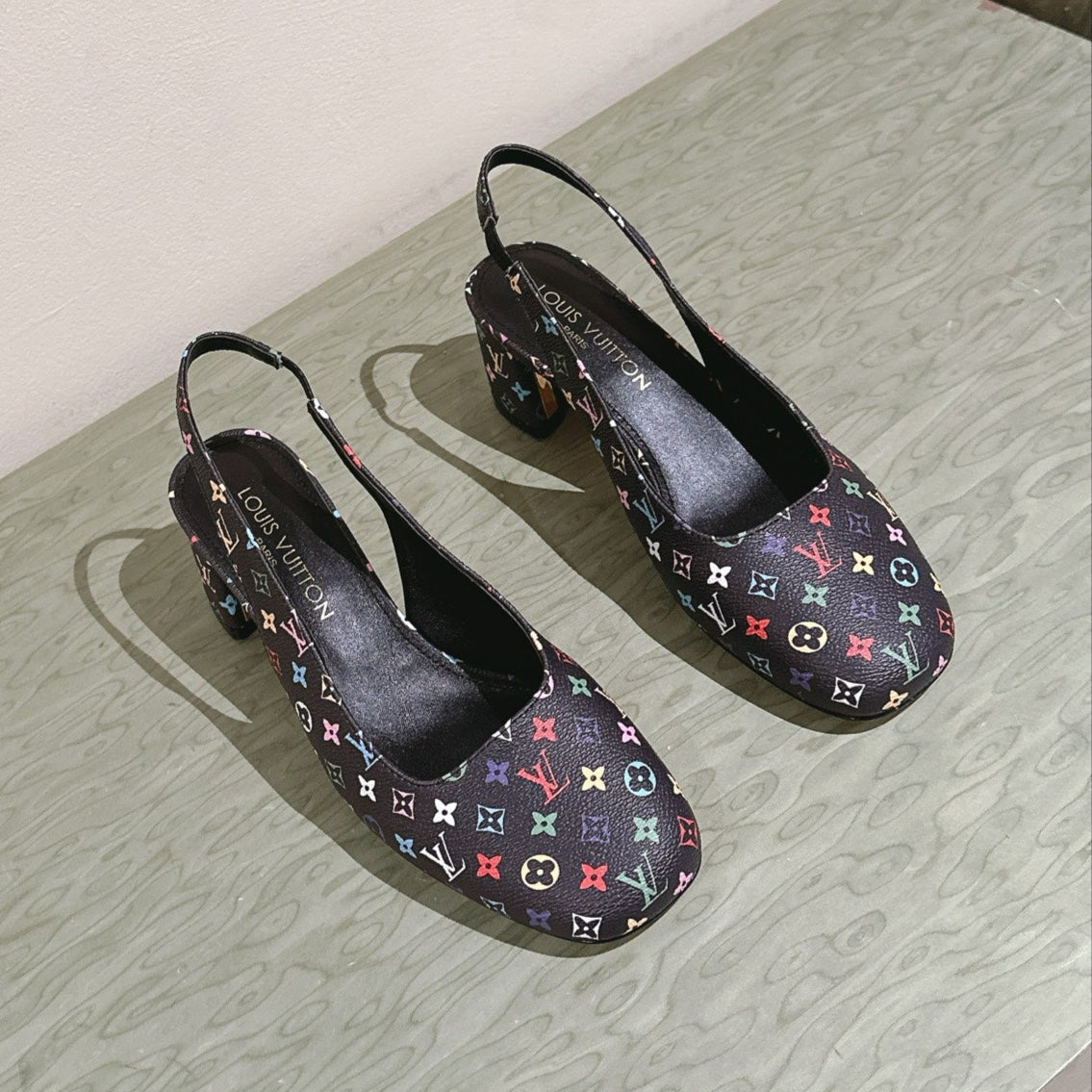 SWING SLINGBACK PUMP 55 MM IN BLACK MONOGRAM CALFSKIN