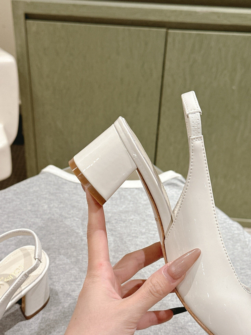 SWING SLINGBACK PUMP 55 MM IN WHITE PATENT CALFSKIN