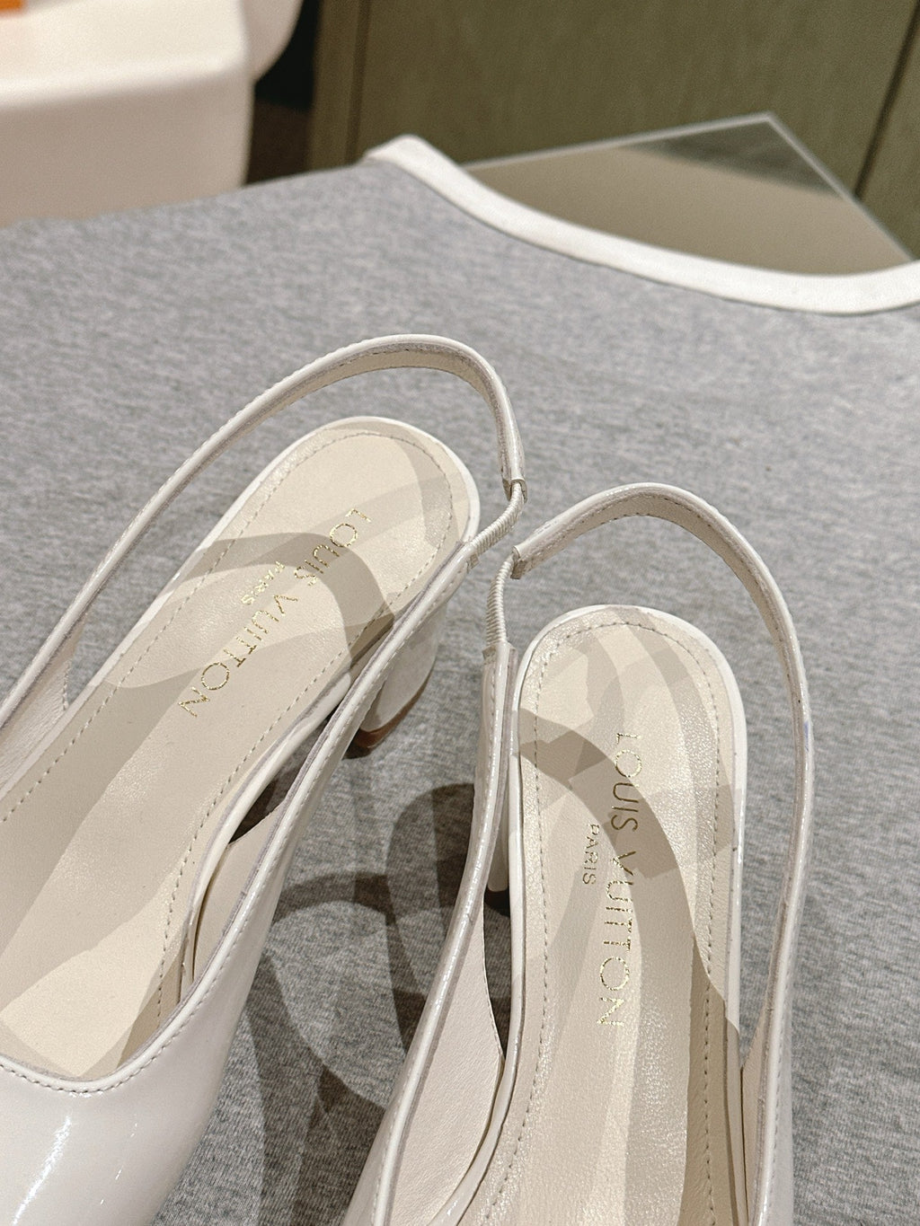 SWING SLINGBACK PUMP 55 MM IN WHITE PATENT CALFSKIN