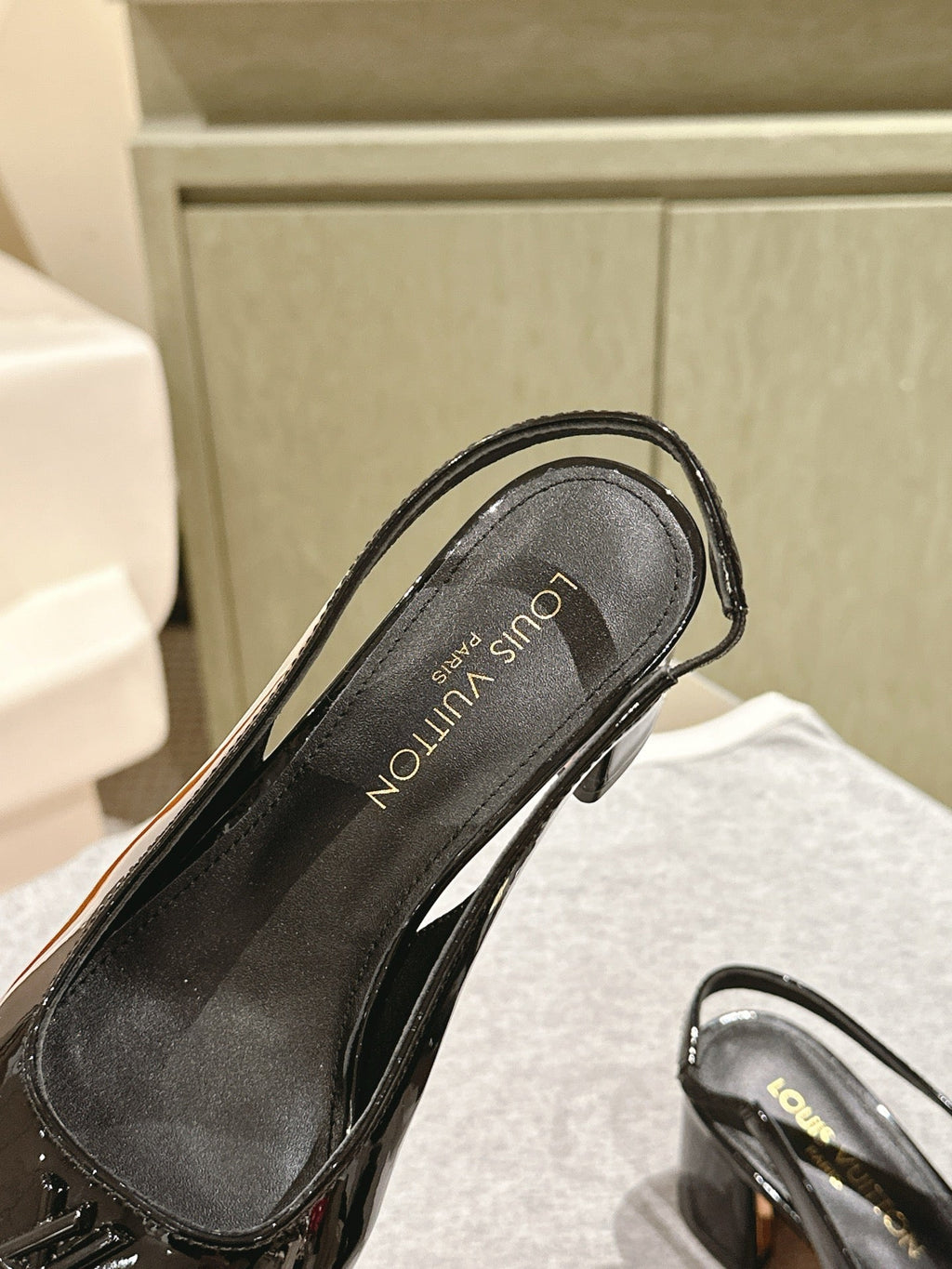 SWING SLINGBACK PUMP 55 MM IN BLACK PATENT CALFSKIN