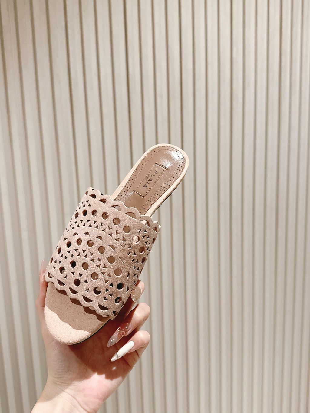 ALAIA PERFORATED SLIDE SANDALS 25S IN PINK BEIGE SUEDE