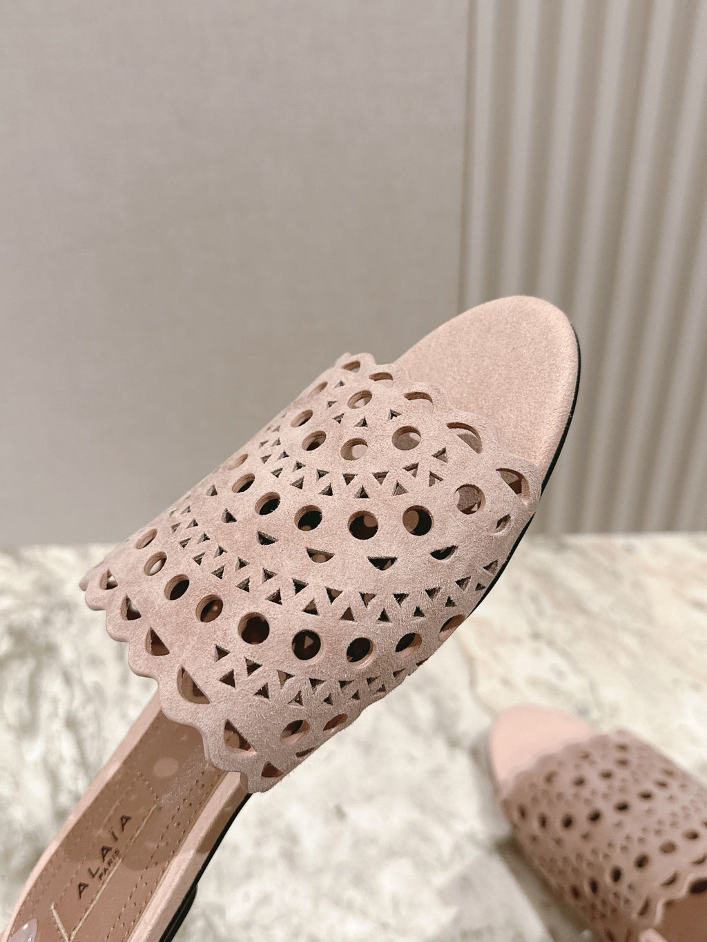 ALAIA PERFORATED SLIDE SANDALS 25S IN PINK BEIGE SUEDE