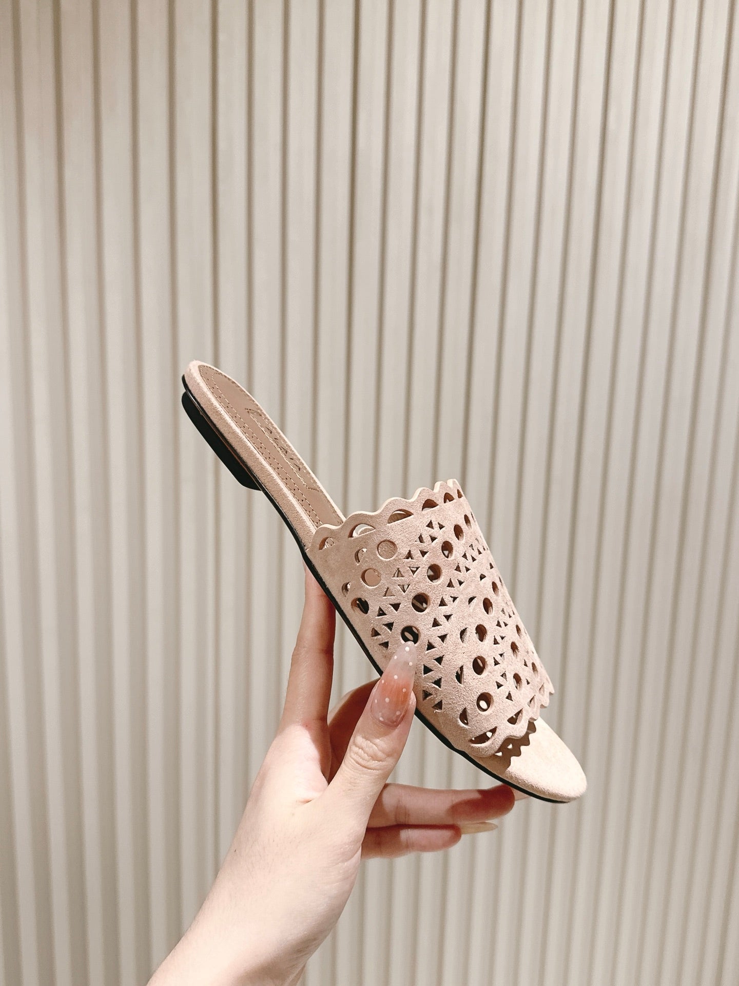 ALAIA PERFORATED SLIDE SANDALS 25S IN PINK BEIGE SUEDE