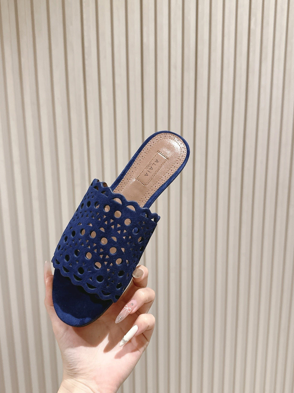 ALAIA PERFORATED SLIDE SANDALS 25S IN NAVY BLUE SUEDE