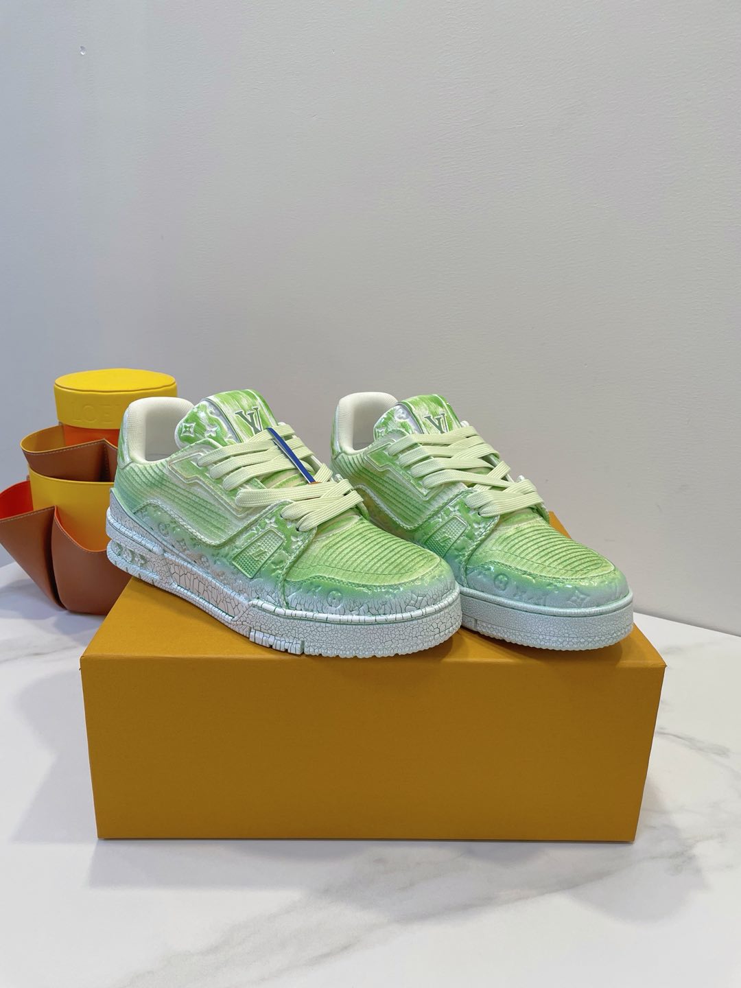 LV TRAINER MAXI SNEAKER IN GREEN PASTEL EMBOSSED CALFSKIN