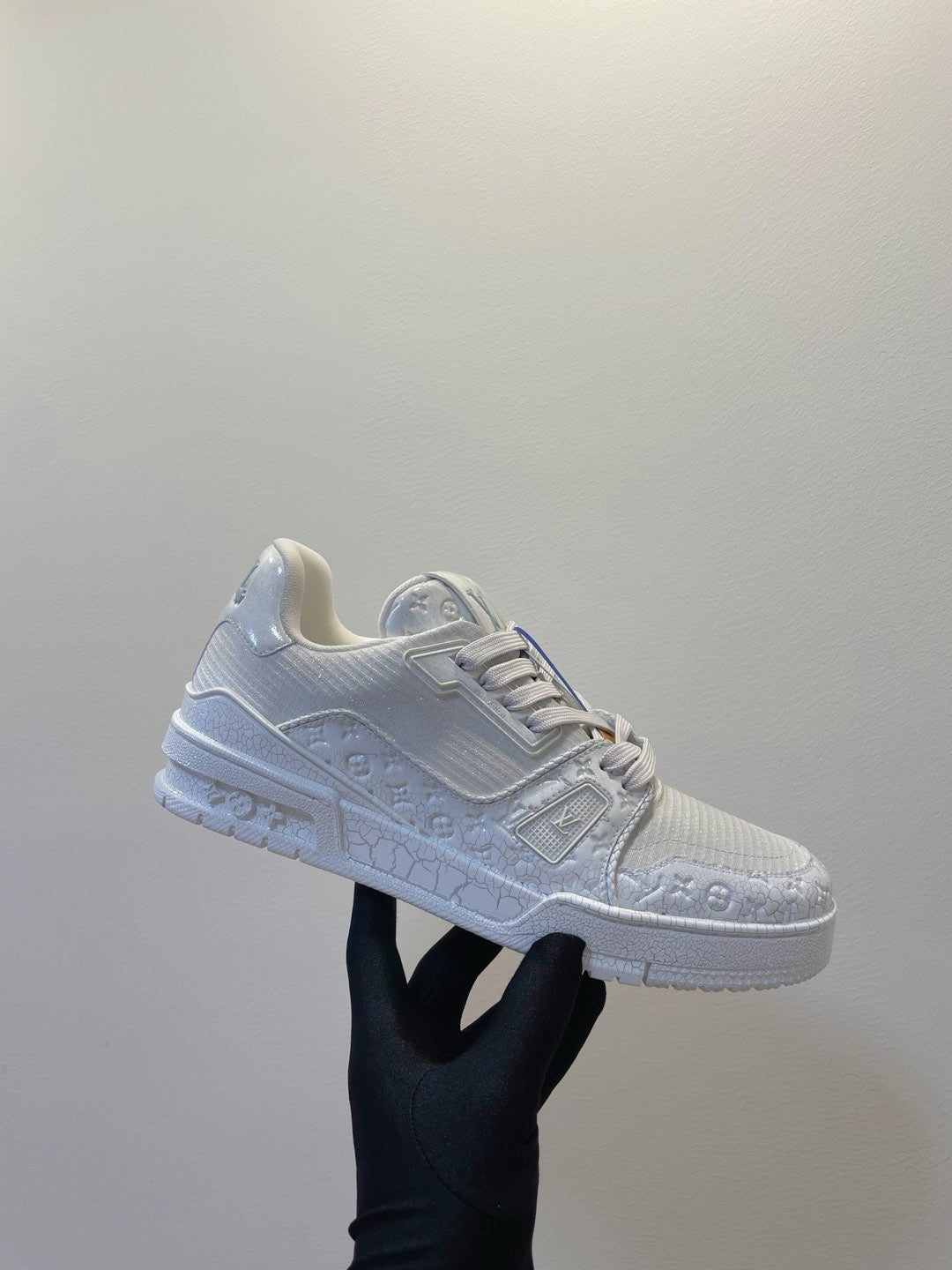 LV TRAINER MAXI SNEAKER IN WHITE EMBOSSED CALFSKIN