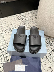 PRADA 25S RUBBER SLIDE IN CHARCOAL CALFSKIN WITH LOGO