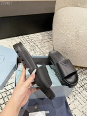 PRADA 25S RUBBER SLIDE IN CHARCOAL CALFSKIN WITH LOGO