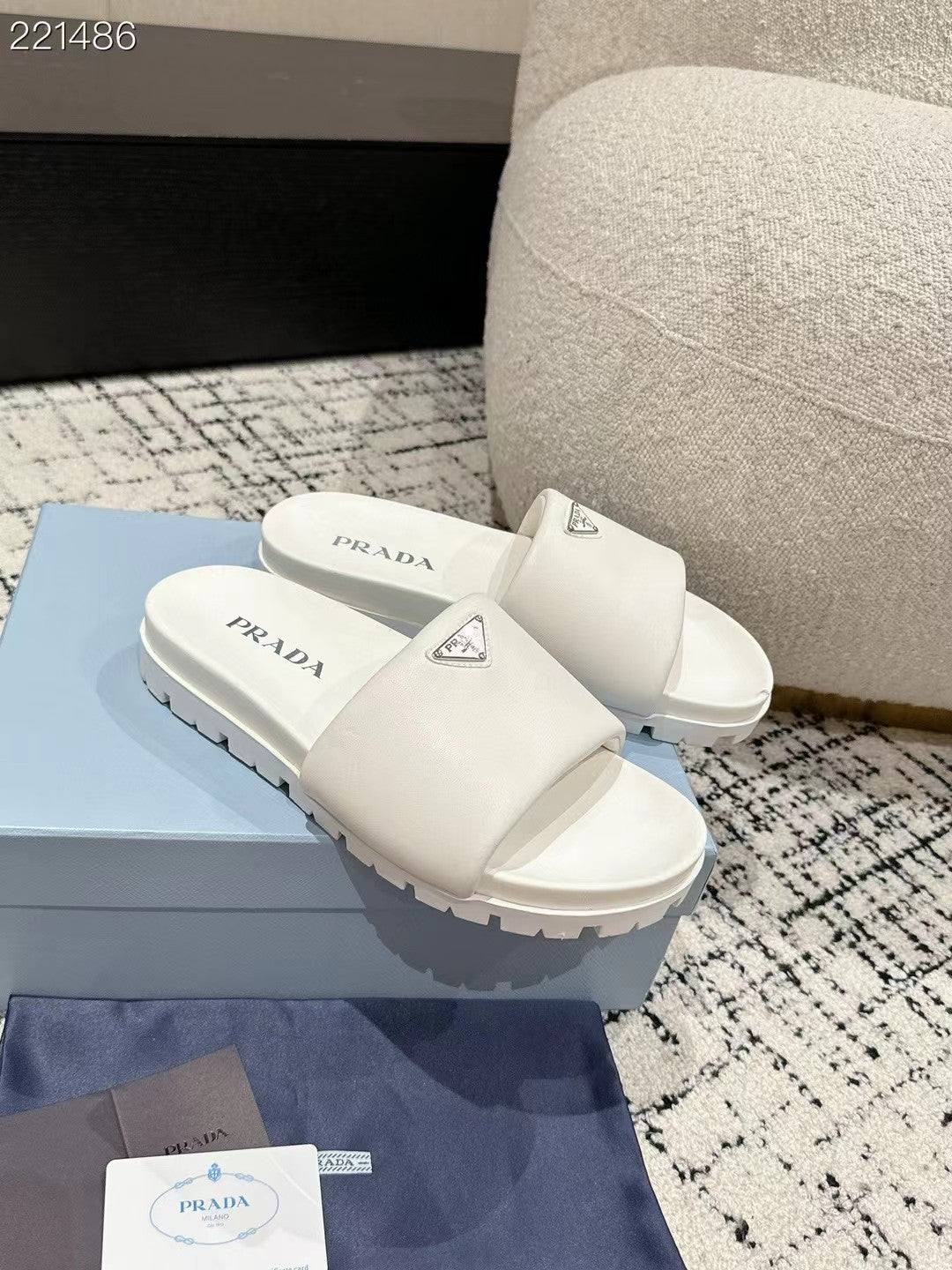 PRADA 25S PADDED SLIDES IN WHITE CALFSKIN WITH LOGO