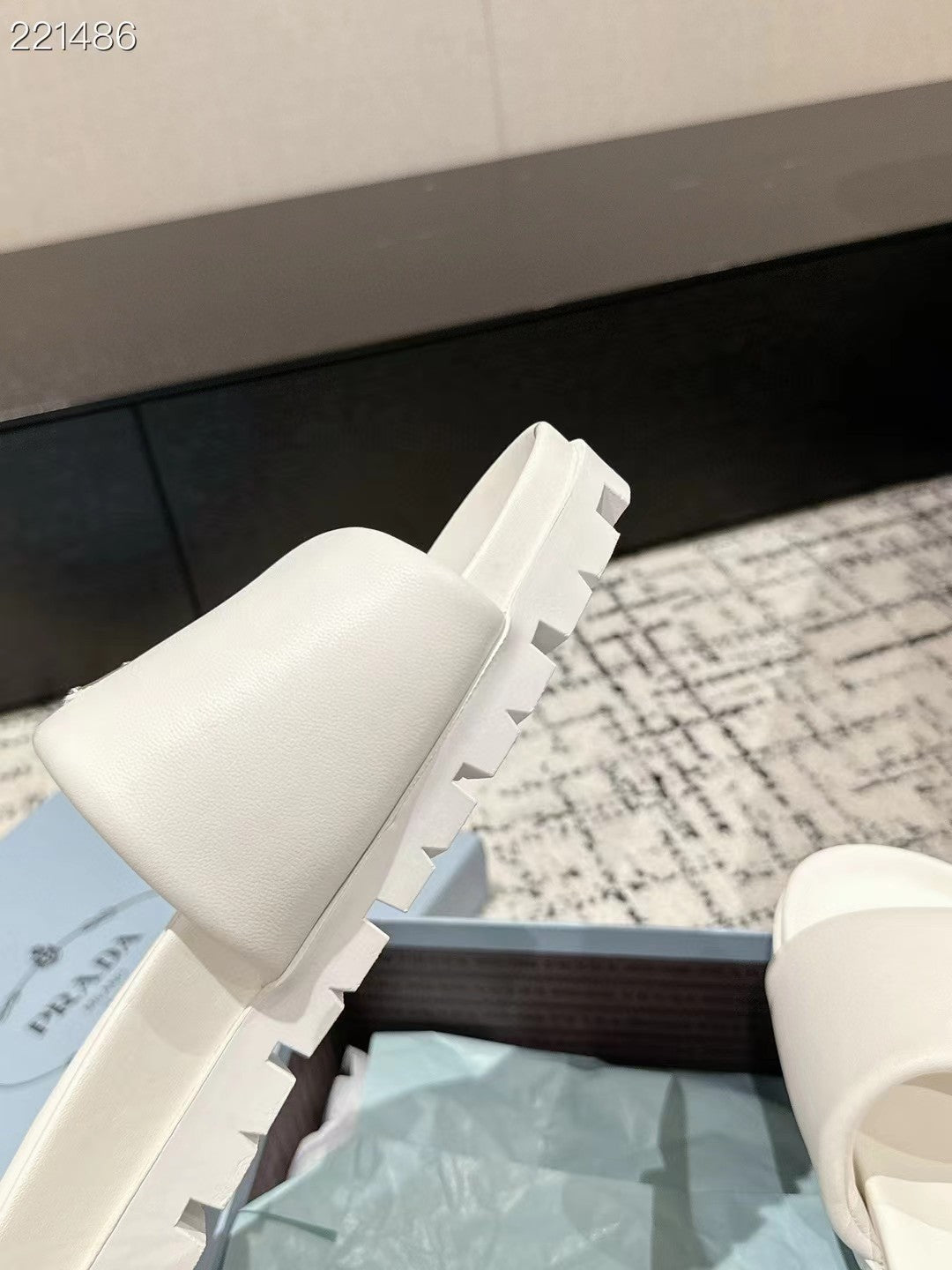 PRADA 25S PADDED SLIDES IN WHITE CALFSKIN WITH LOGO