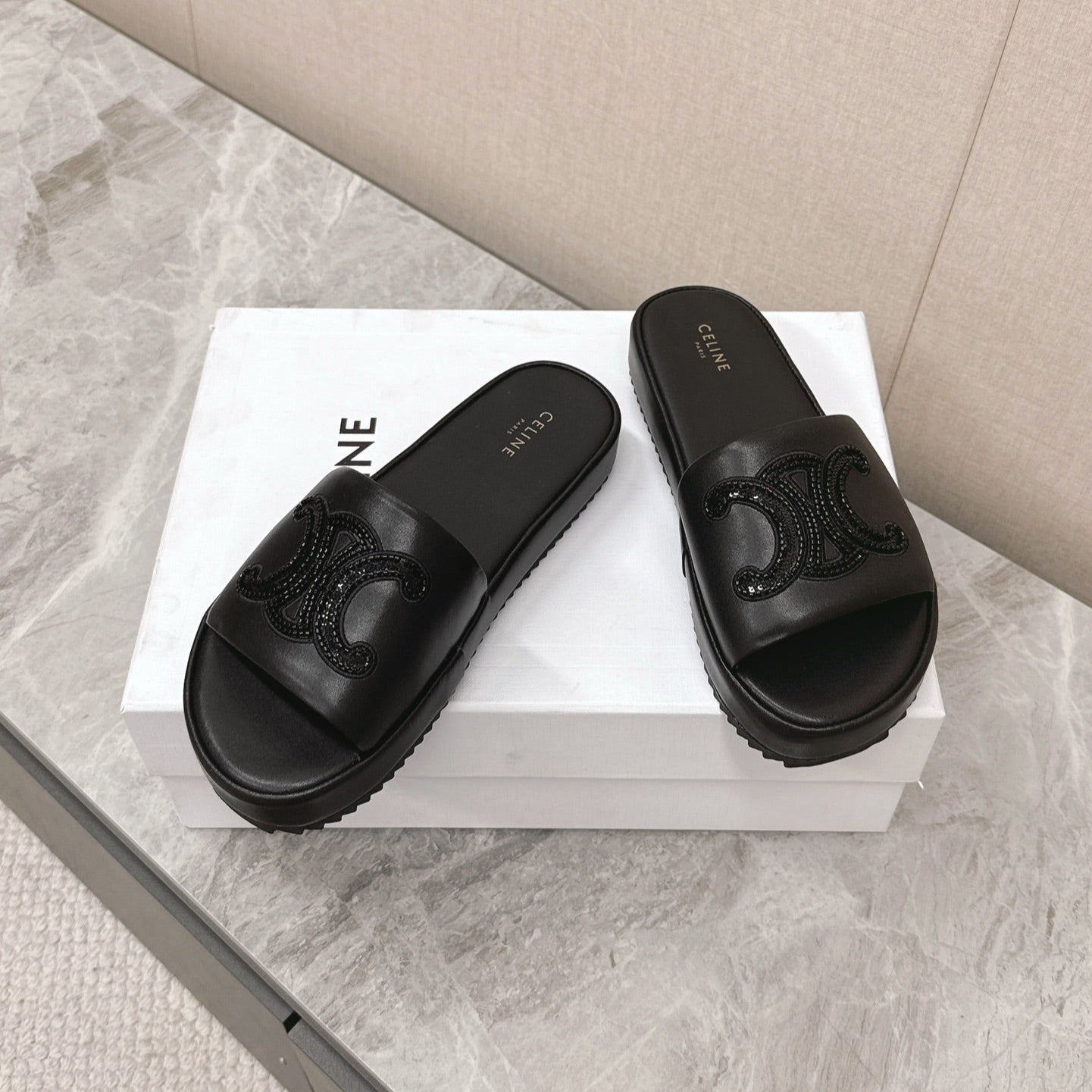 THICK-SOLED SLIDES IN BLACK SMOOTH LAMBSKIN LOGO WITH CRYSTALS