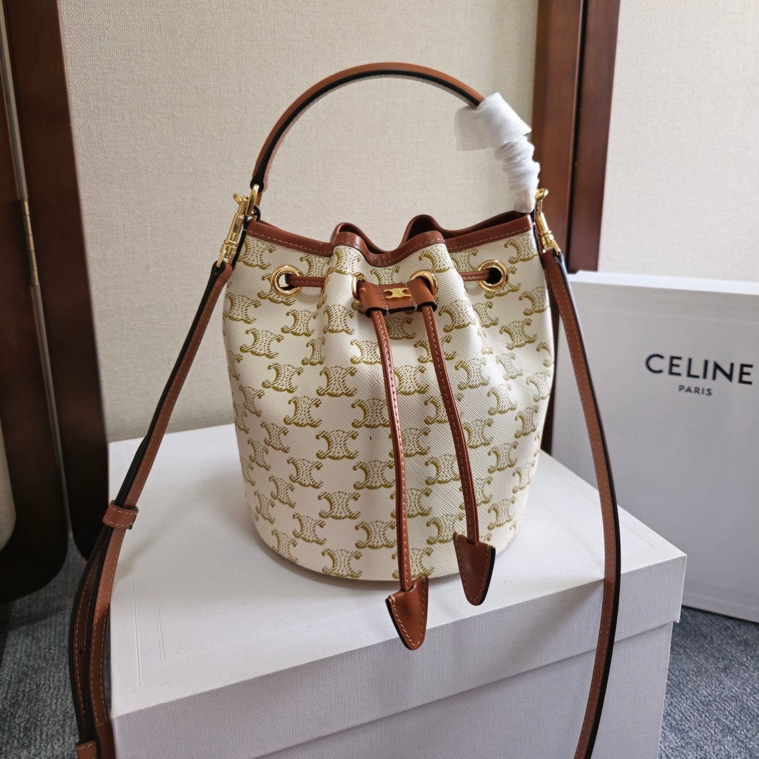 CLARA BAG 19 IN WHITE TRIOMPHE CANVAS AND BROWN CALFSKIN TRIM