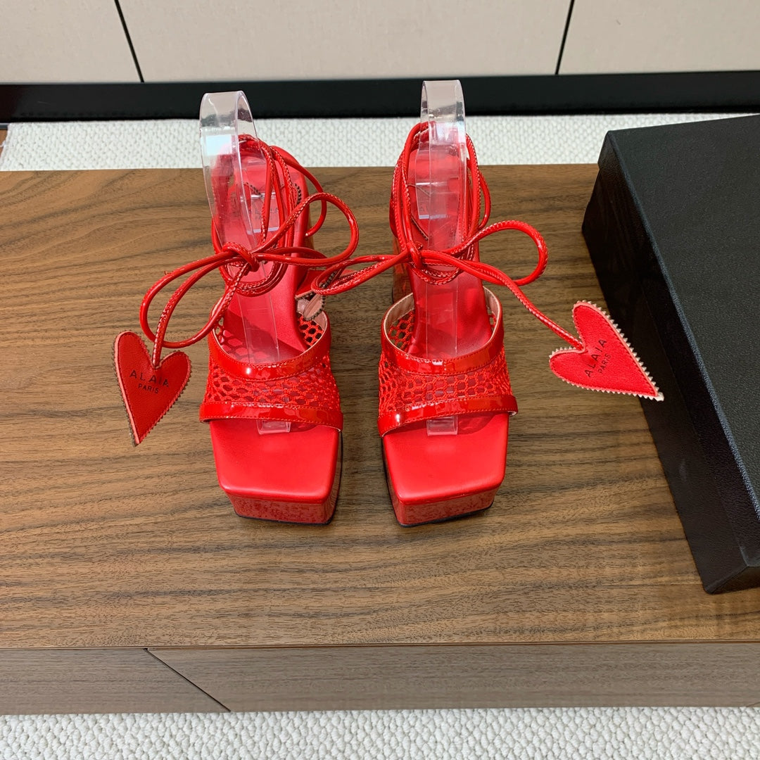 ALAIA BANQUET WEDGE SANDALS IN CHERRY RED LAMBSKIN WITH RED HEART