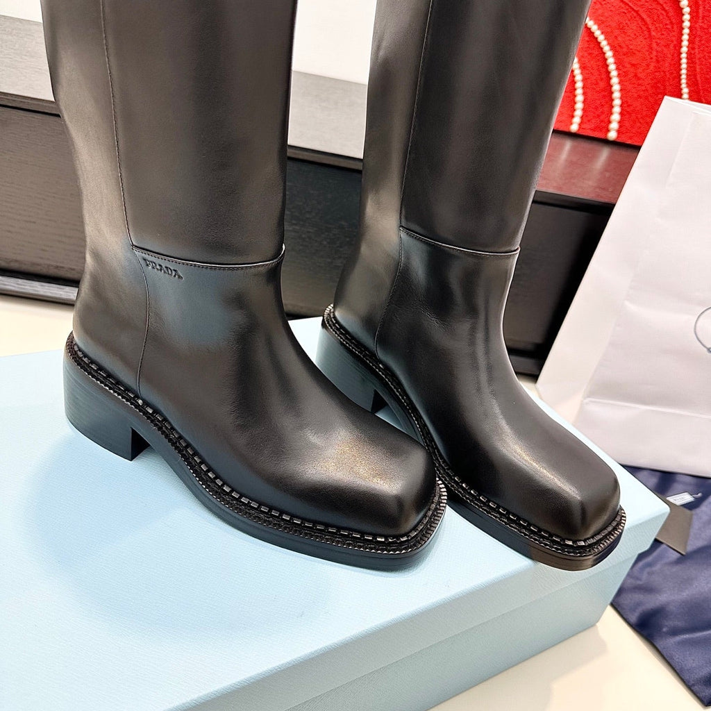 PRADA 25S SQUARE-TOE HIGH-CUT BOOTS IN BLACK CALFSKIN