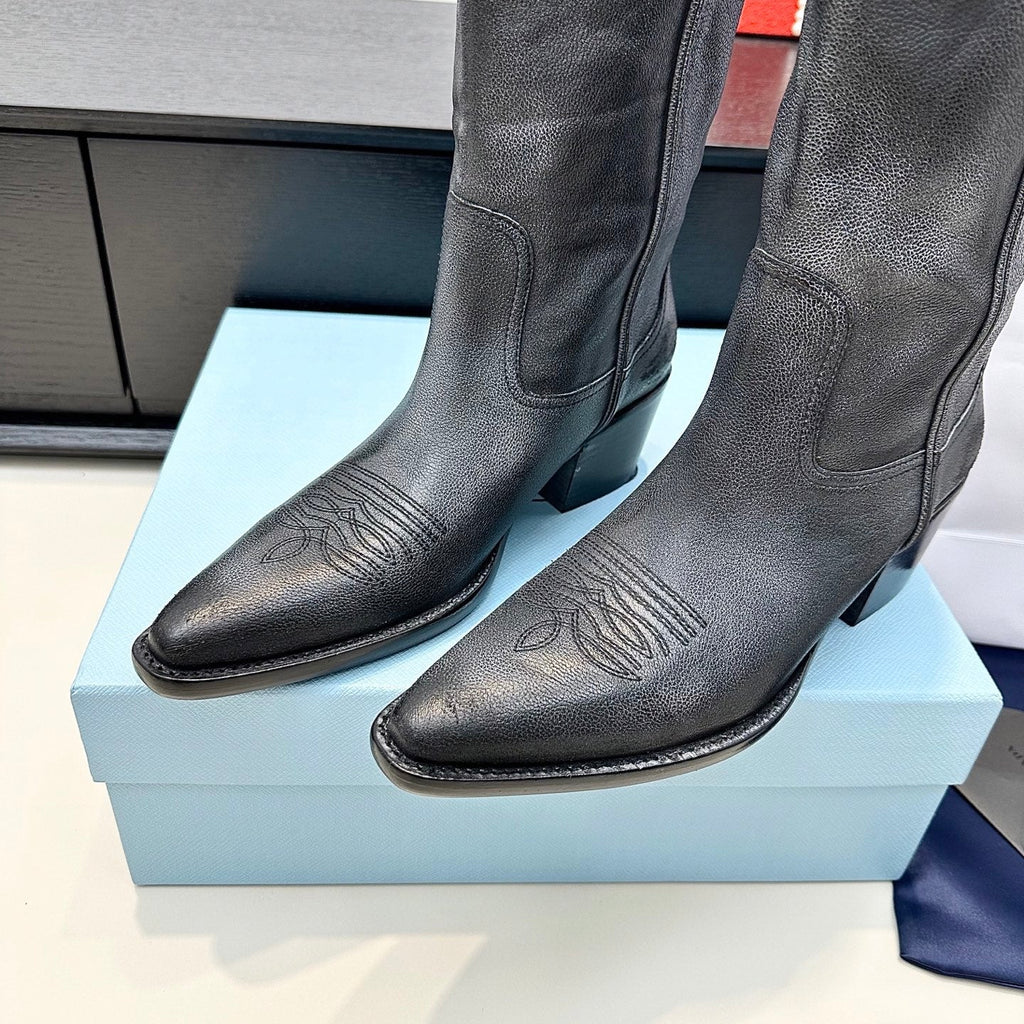 PRADA 25S POINTED-TOE LOW-CUT BOOTS IN BLACK COWHIDE