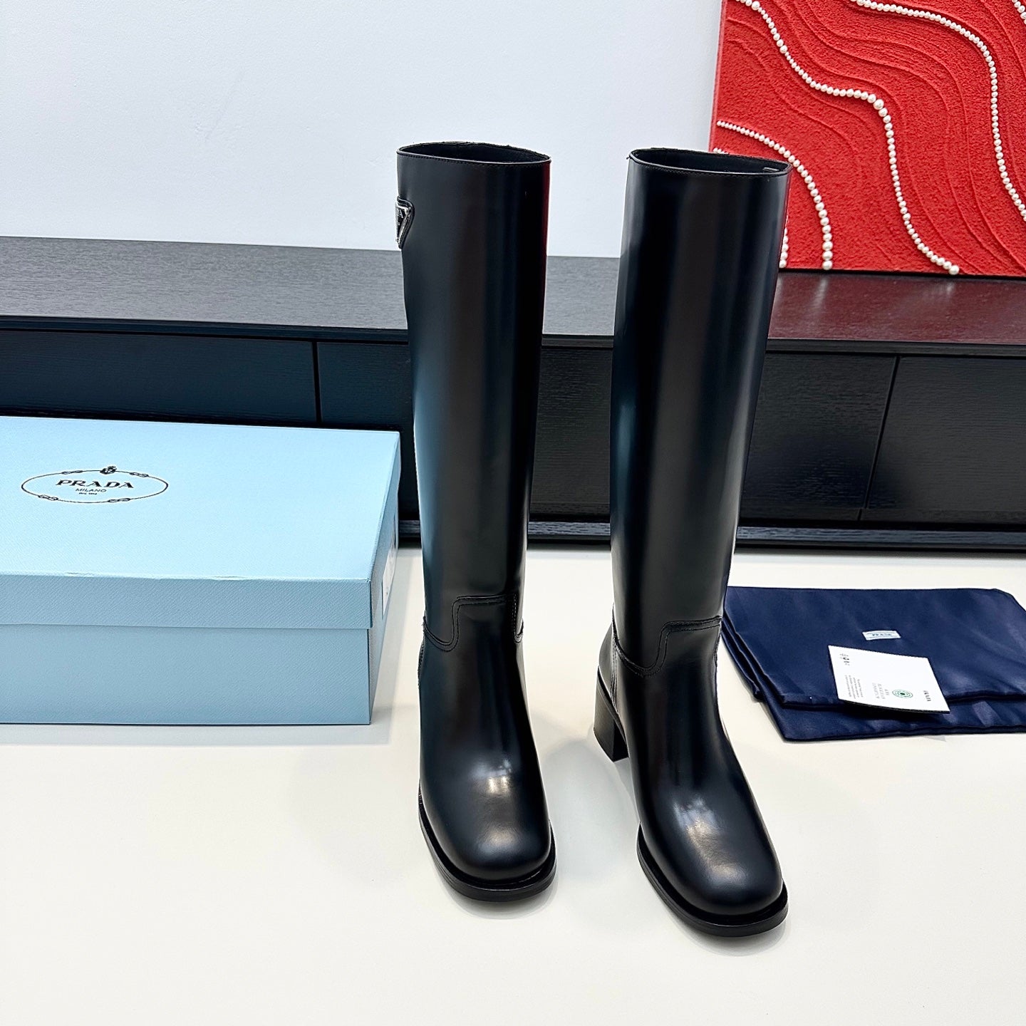 PRADA 25S HIGH-CUT BOOTS 55 MM IN BLACK CALFSKIN