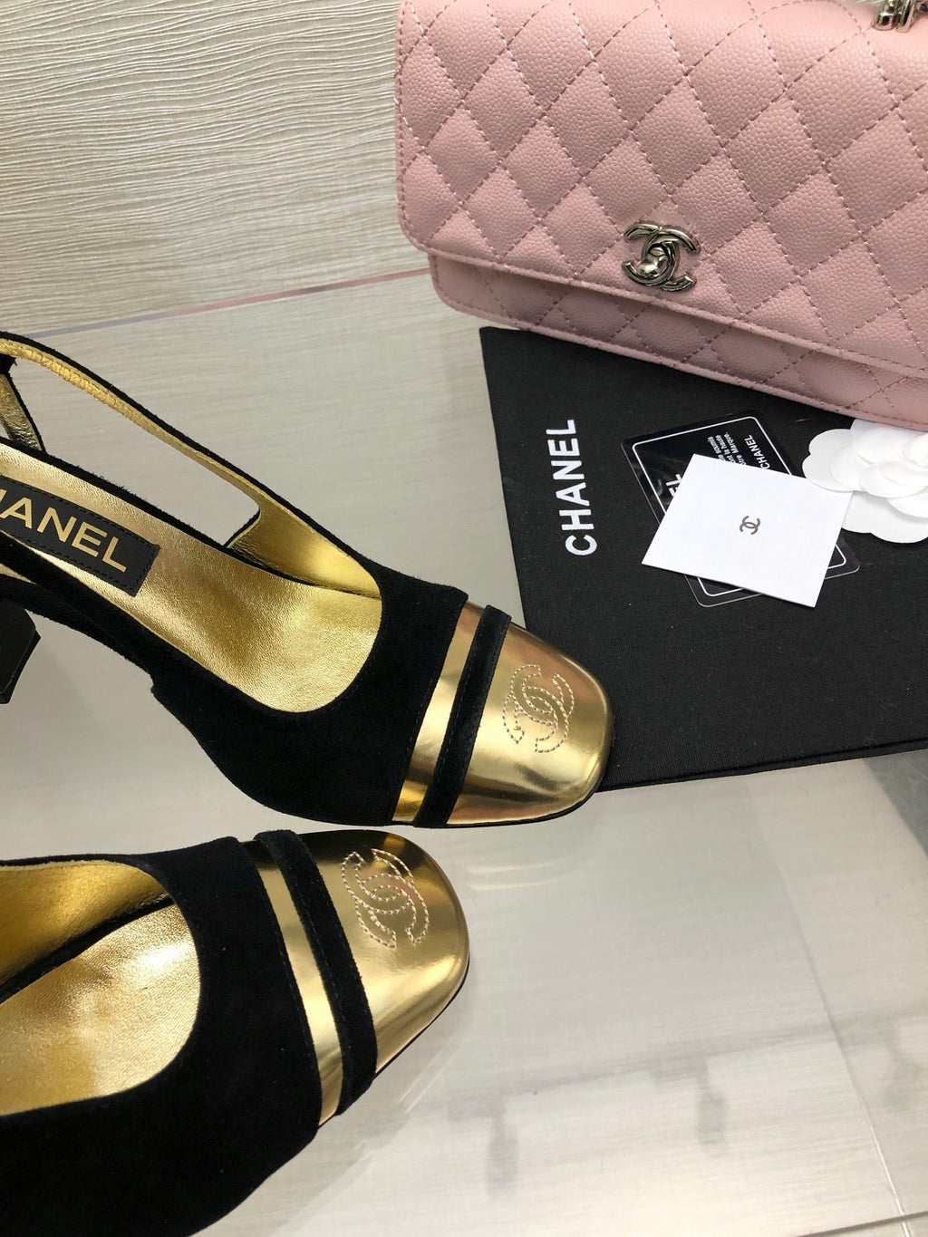 HIGH SLINGBACKS IN BLACK SUEDE AND GOLDEN LAMBSKIN