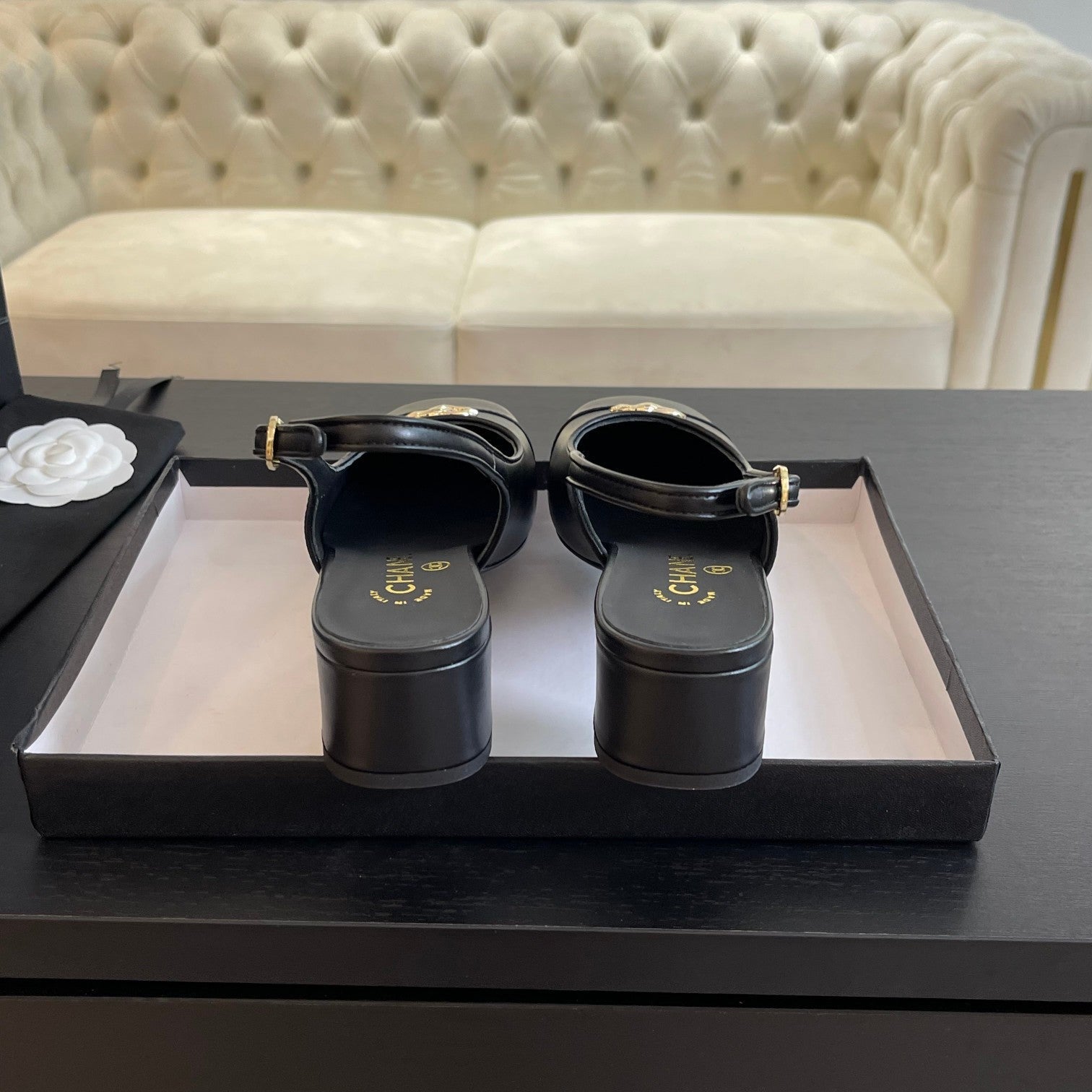 CC SLINGBACKS IN BLACK CALFSKIN