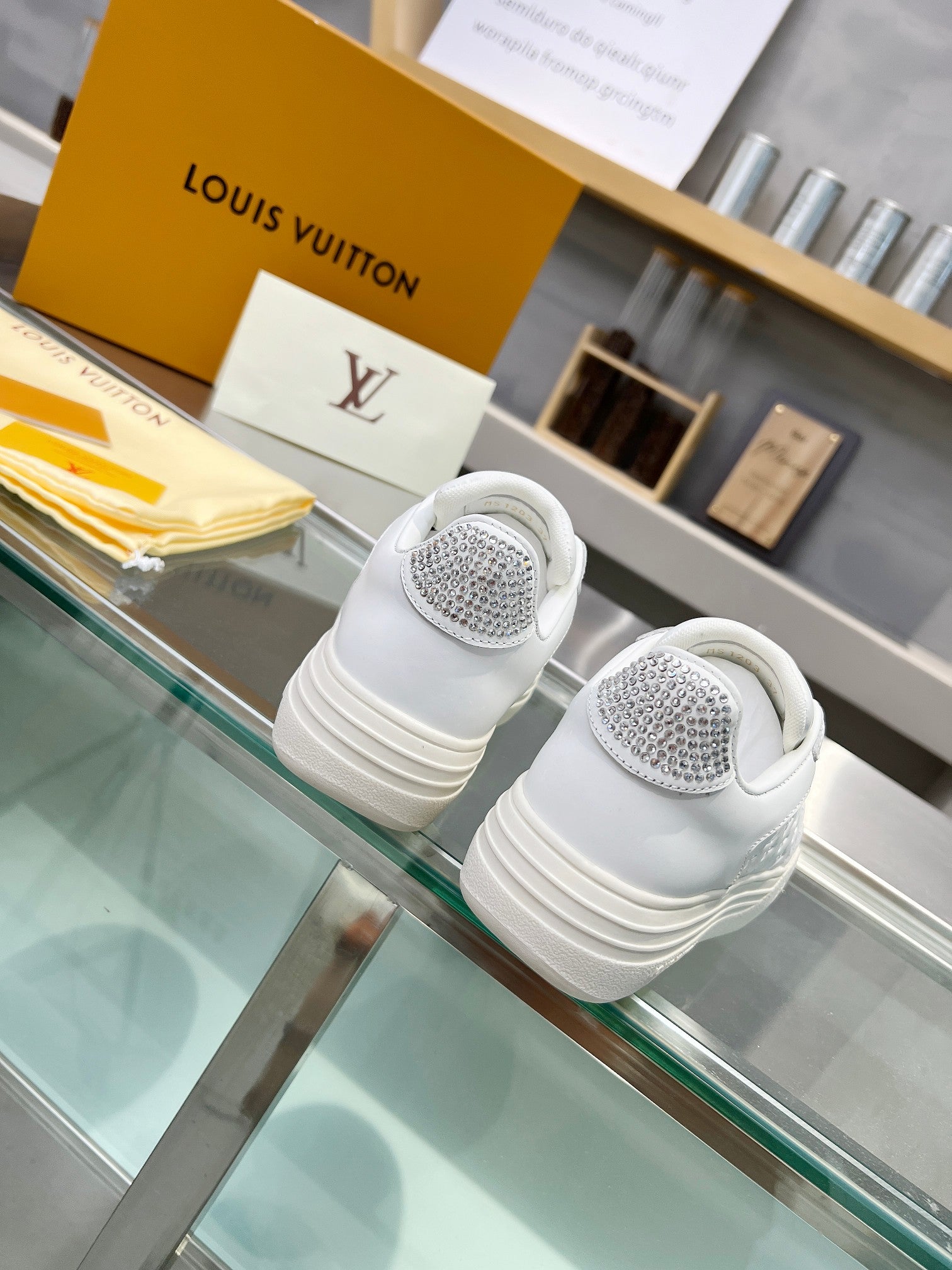 LV WOMEN GROOVY PLATFORM IN WHITE EMBOSSED CALFSKIN