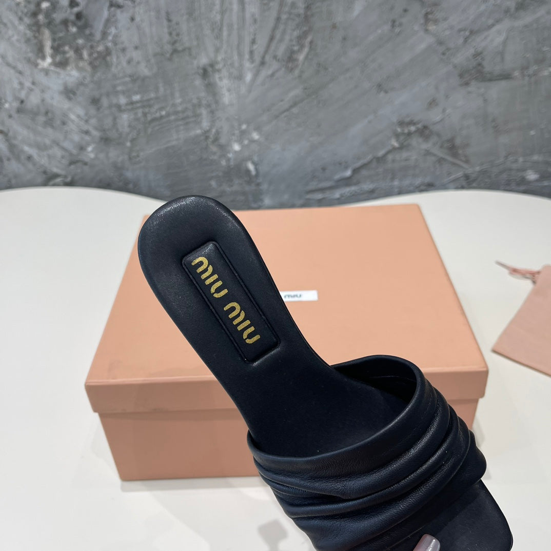 HIGH - HEEL BLACK SHEEPSKIN WITH STYLIZED STRAPS