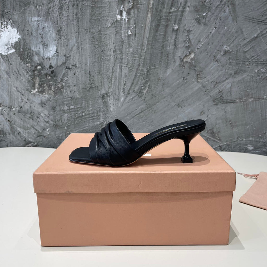 HIGH - HEEL BLACK SHEEPSKIN WITH STYLIZED STRAPS