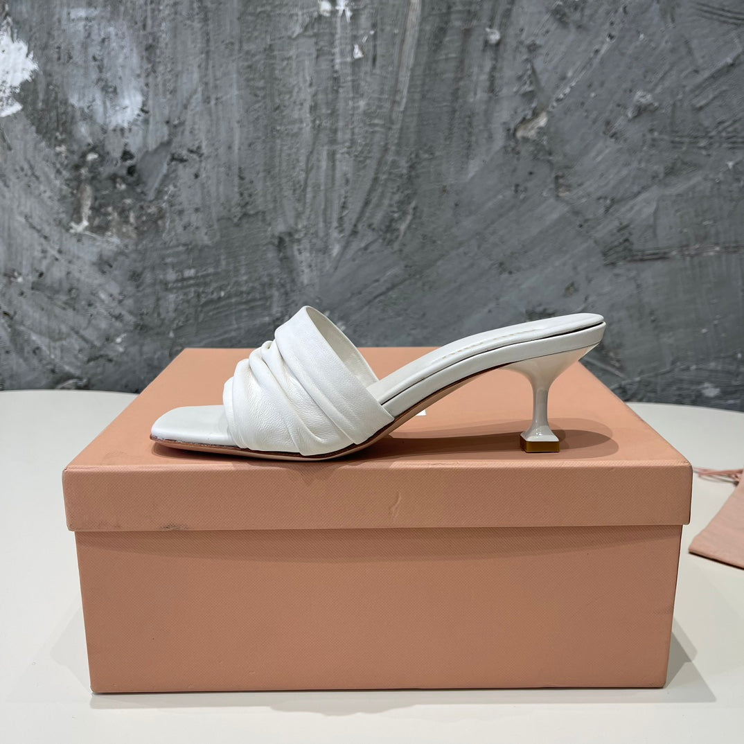 HIGH - HEEL WHITE SHEEPSKIN WITH STYLIZED STRAPS