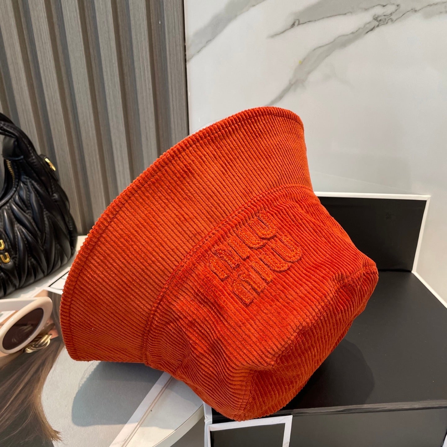 MM BUCKET IN ORANGE VELVET WITH LOGO