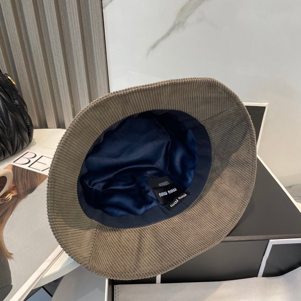 MM BUCKET IN MUTED BROWN VELVET WITH LOGO