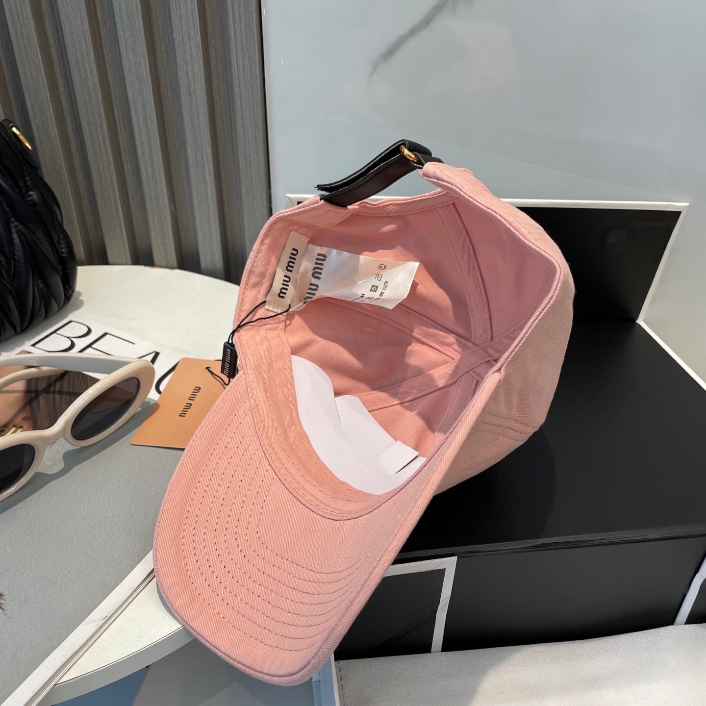 MM BASEBALL CAP IN PEACHY PINK FABRIC BRAND EMBROIDERY