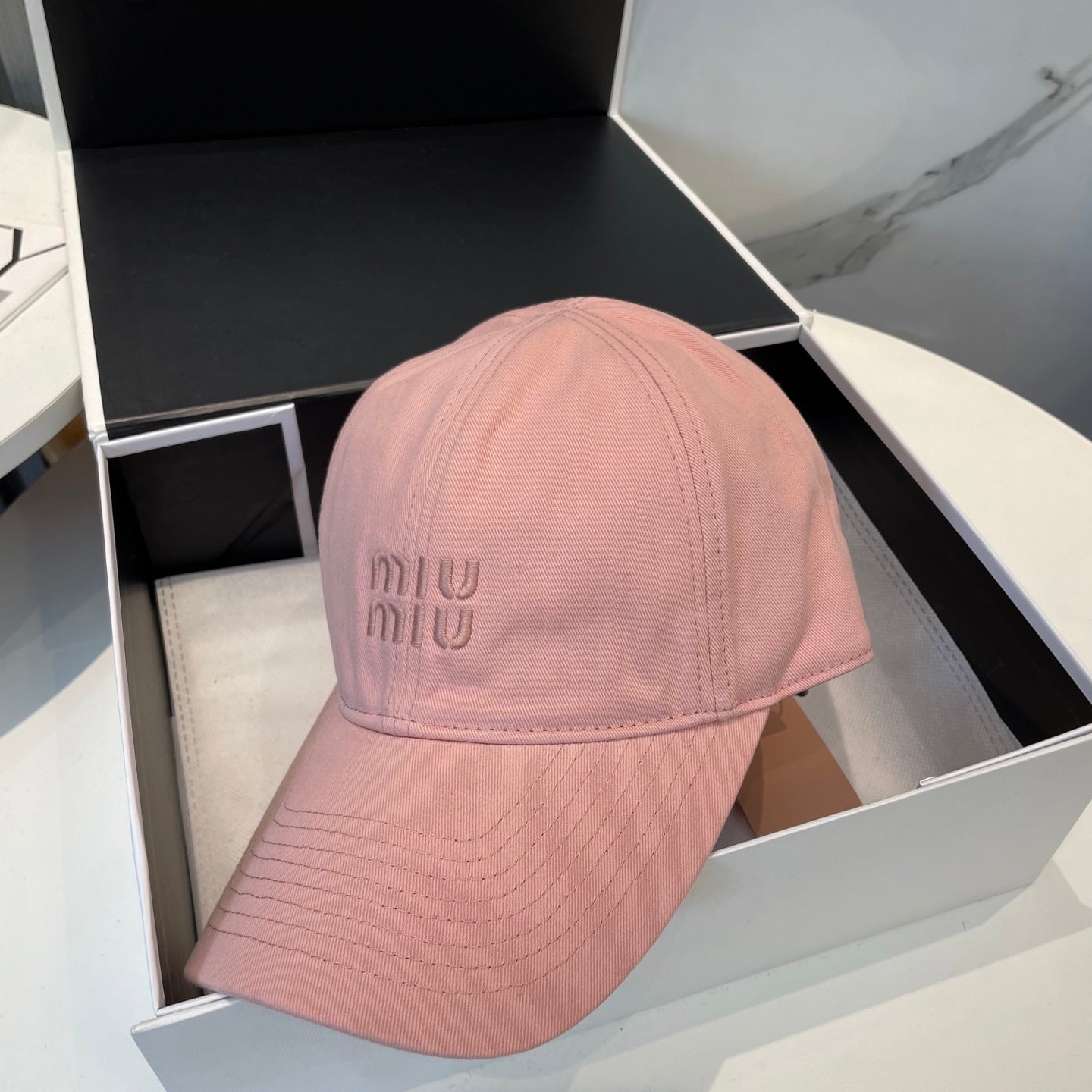 MM BASEBALL CAP IN PEACHY PINK FABRIC BRAND EMBROIDERY