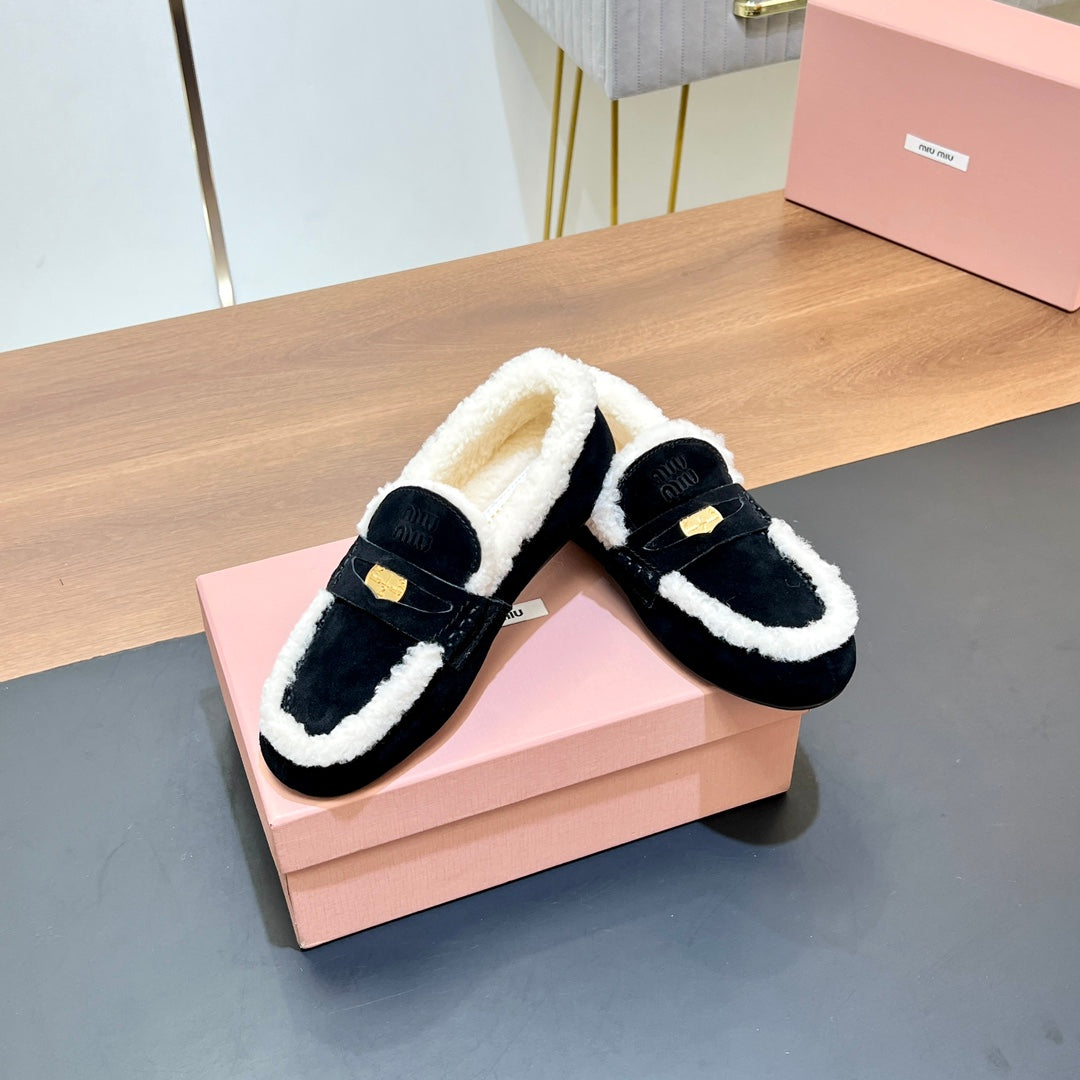 LOAFERS IN BLACK SUEDE AND WHITE SHEARLING TRIM