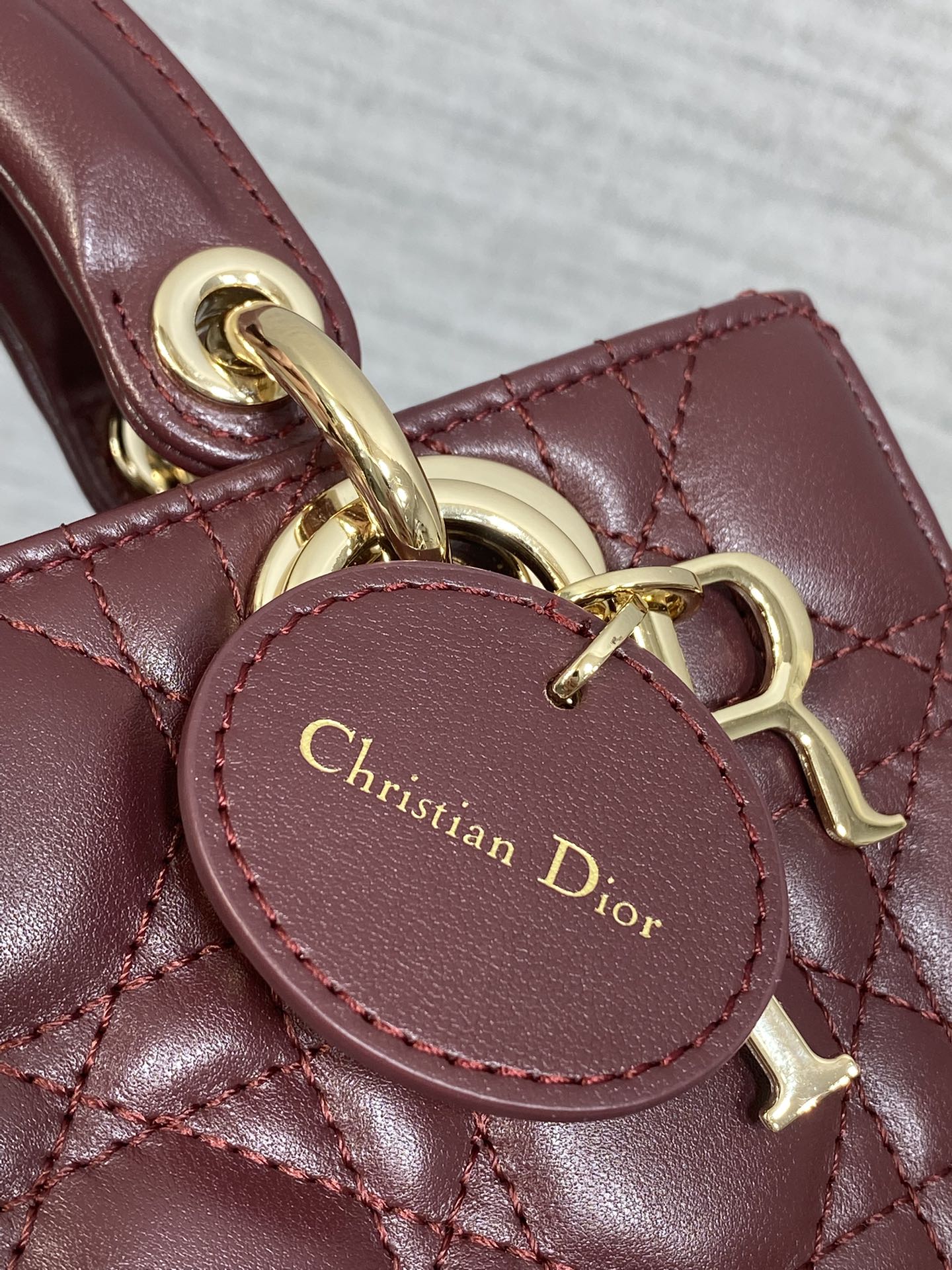 DIOR 25S SMALL LADY D‑JOY BAG 19 IN BURGUNDY CANNAGE CALFSKIN GOLD HARDWRE