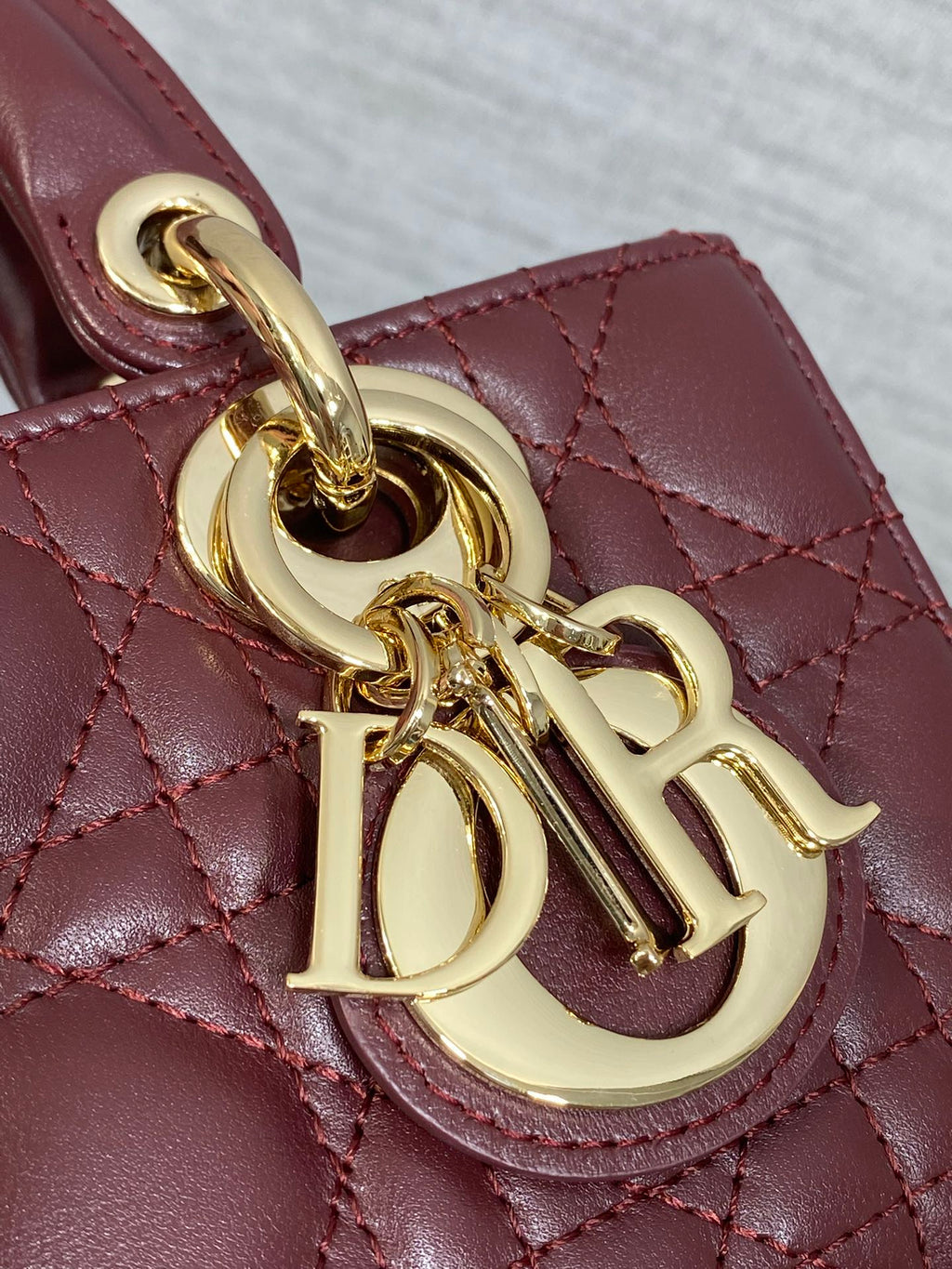 DIOR 25S SMALL LADY D‑JOY BAG 19 IN BURGUNDY CANNAGE CALFSKIN GOLD HARDWARE