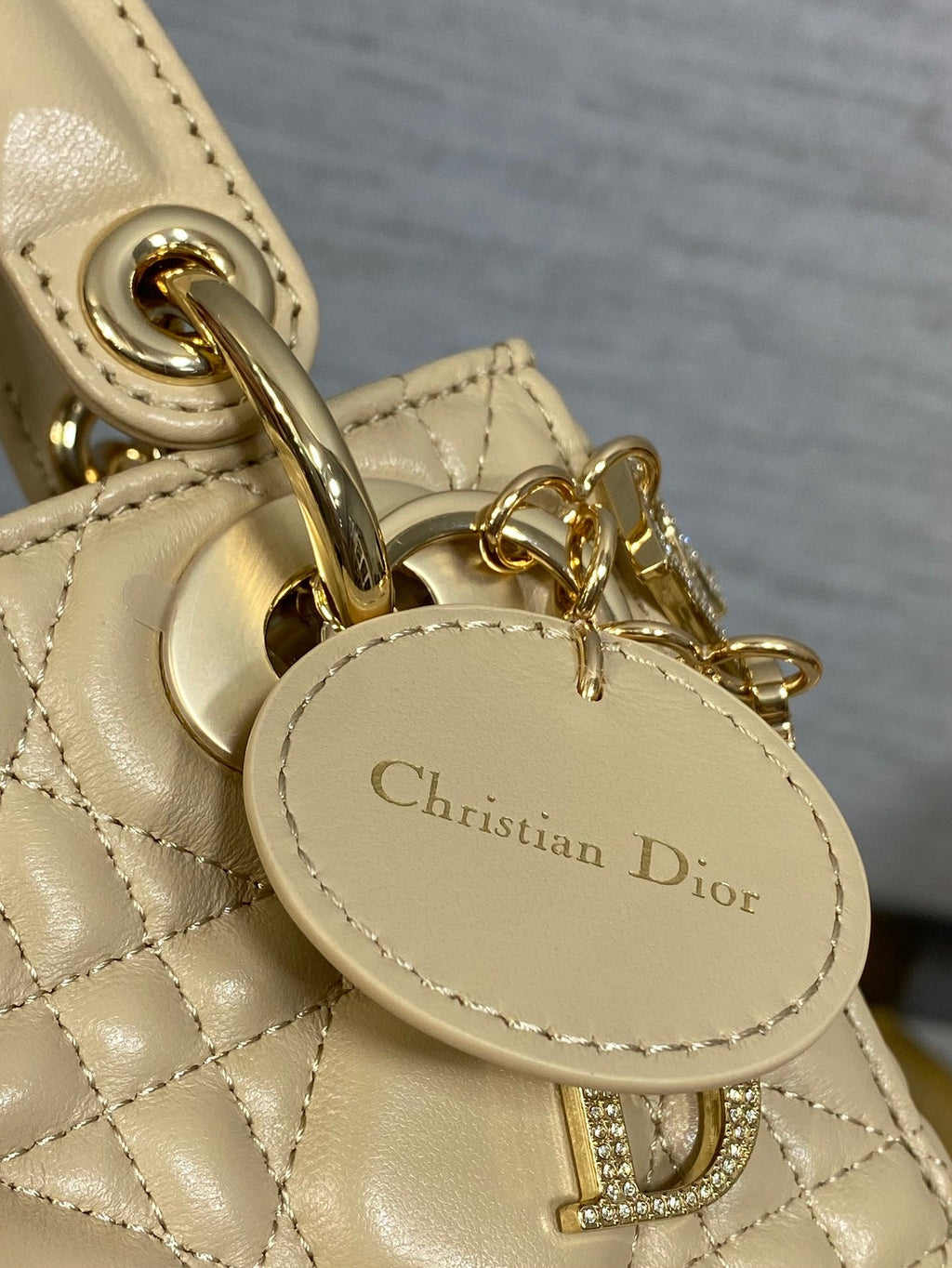 DIOR 25S MINI LADY DIOR BAG 17 IN BISCUIT CALFSKIN CHARM CRYSTAL EMBELLISHMENTS