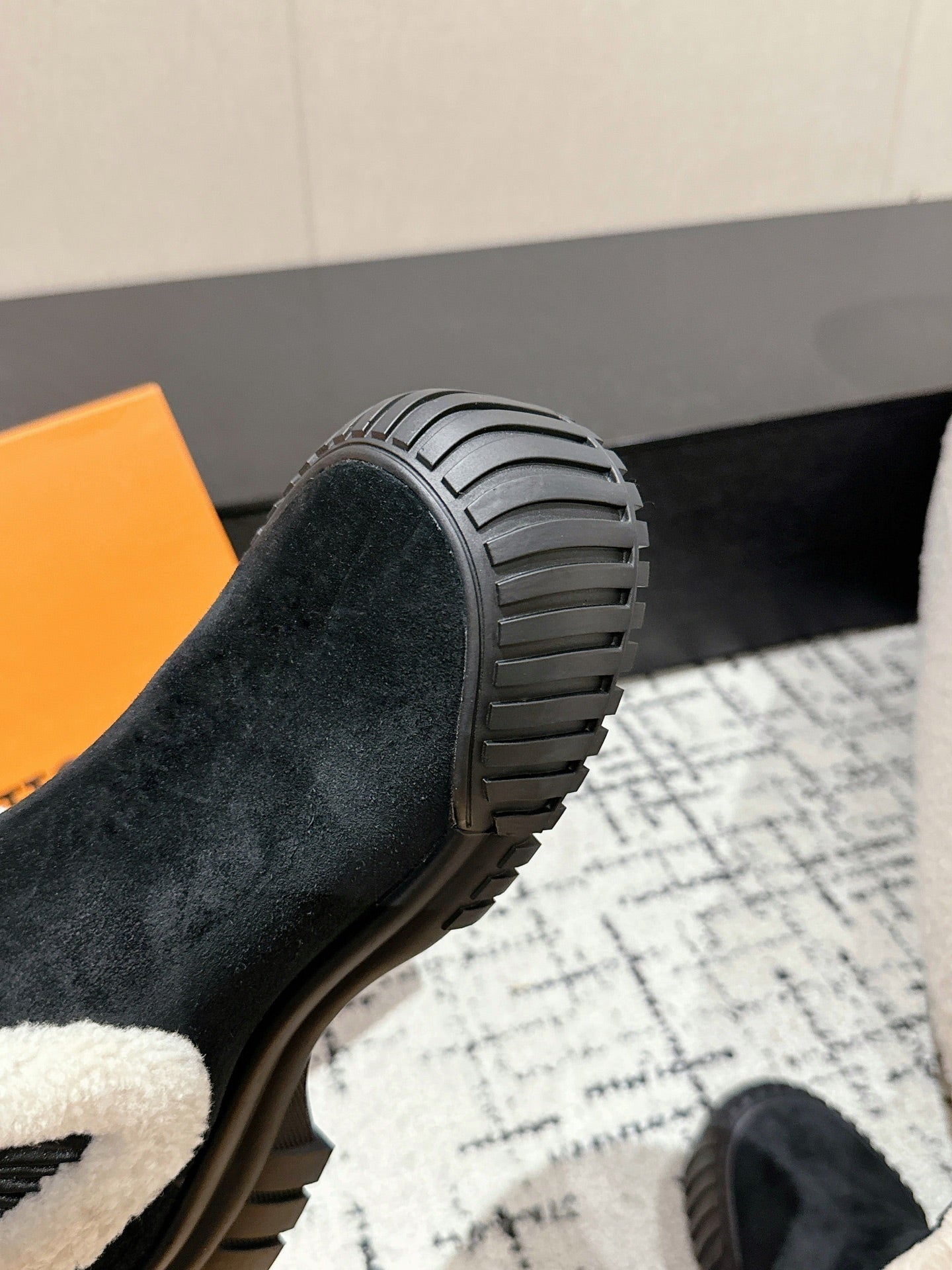 RUBY FLAT ANKLE BOOT IN BLACK SUEDE WITH WHITE SHEARLING