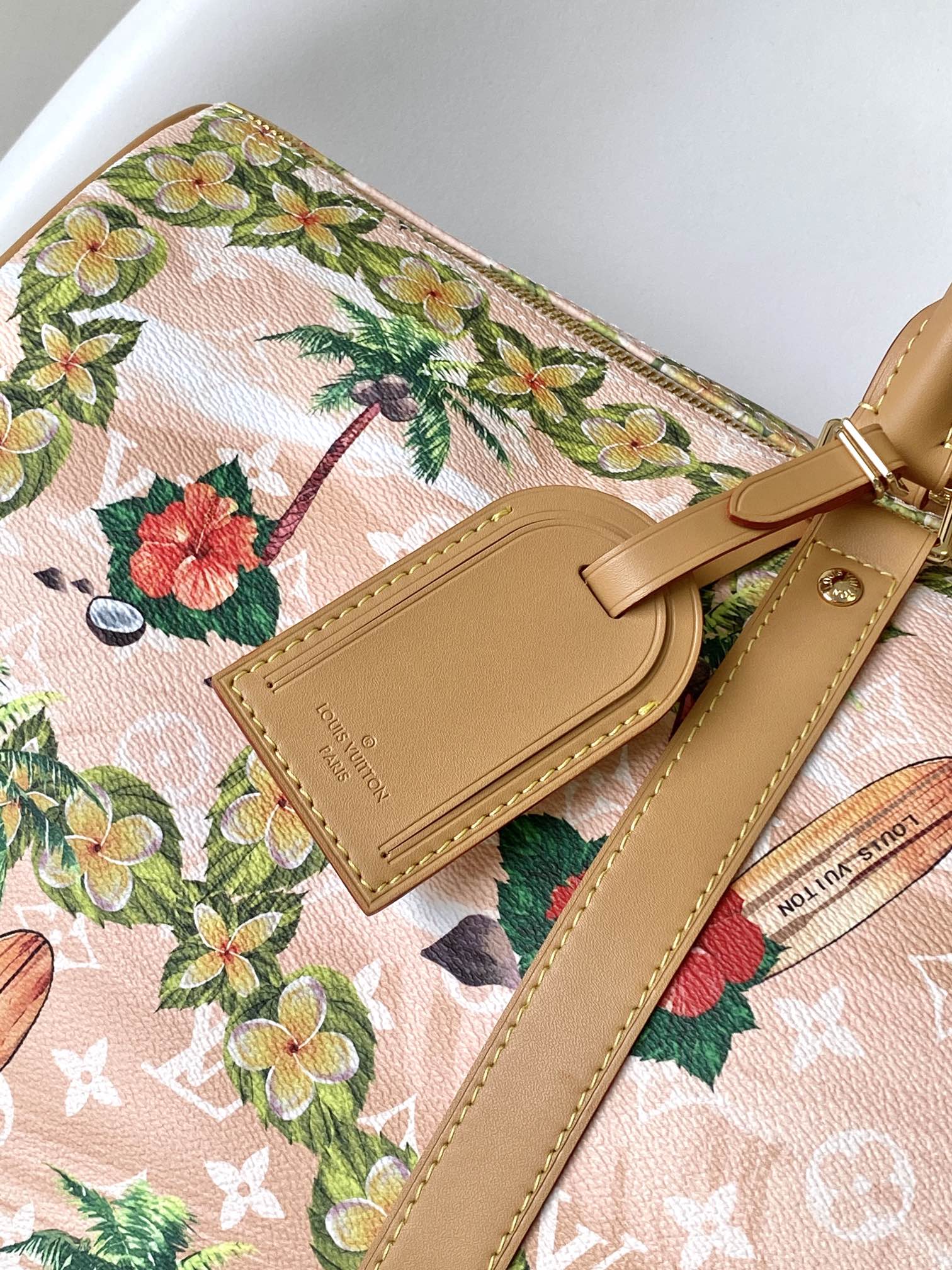 KEEPALL BANDOULIÈRE 50 IN SAND TROPICAL MOTIFS MONOGRAM SURFIN CANVAS