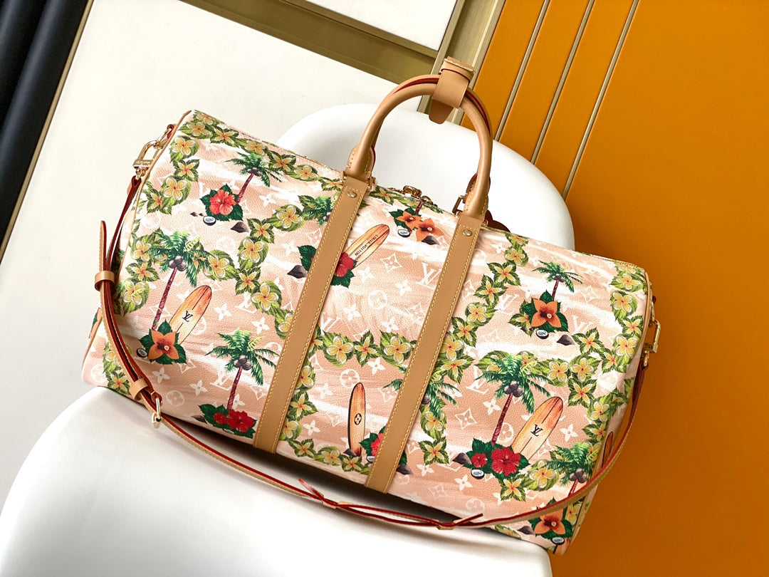 KEEPALL BANDOULIÈRE 50 IN SAND TROPICAL MOTIFS MONOGRAM SURFIN CANVAS