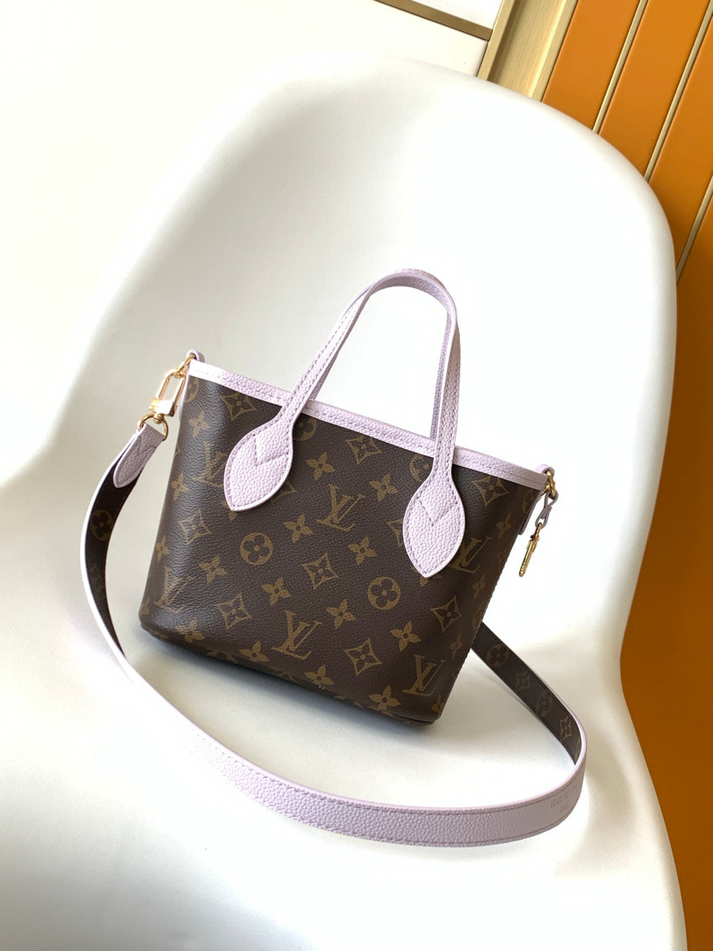 LV 25S NEVERFULL BANDOULIÈRE INSIDE OUT BB 31 IN LIGHT PURPLE AND BROWN CALFSKIN