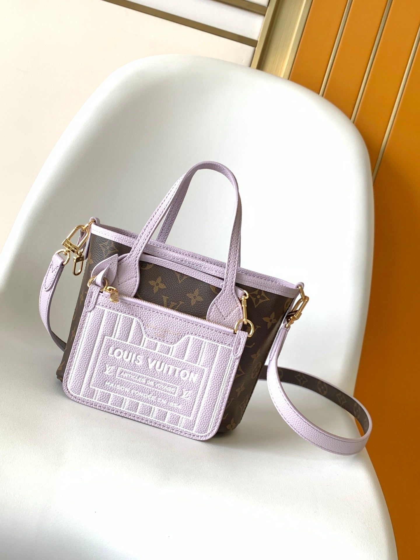 LV 25S NEVERFULL BANDOULIÈRE INSIDE OUT BB 31 IN LIGHT PURPLE AND BROWN CALFSKIN