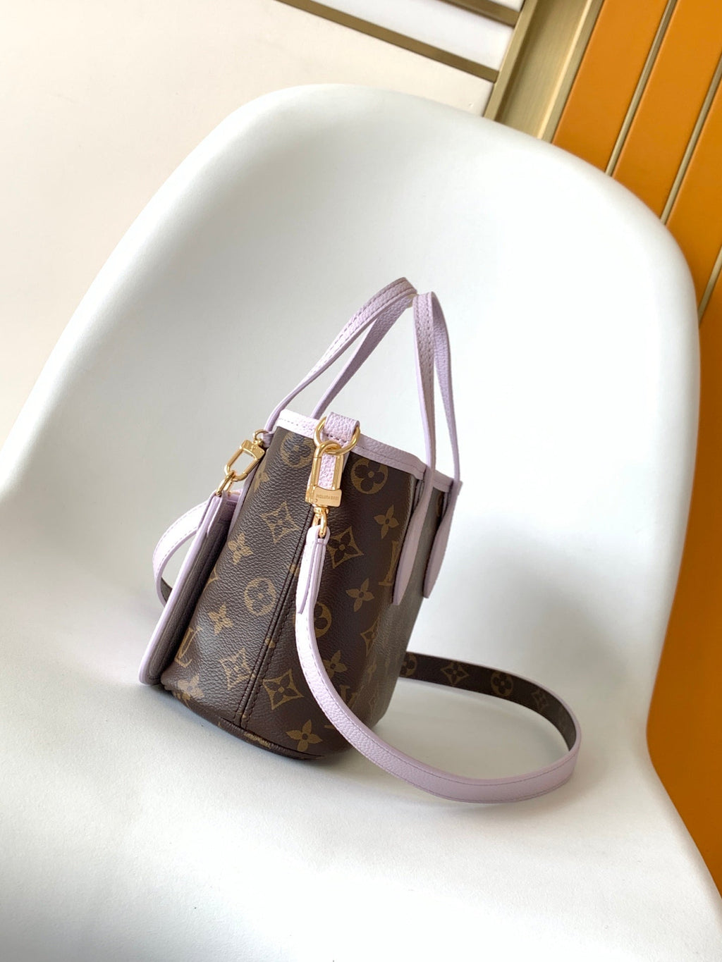 LV 25S NEVERFULL BANDOULIÈRE INSIDE OUT BB 24 IN LIGHT PURPLE AND BROWN CALFSKIN