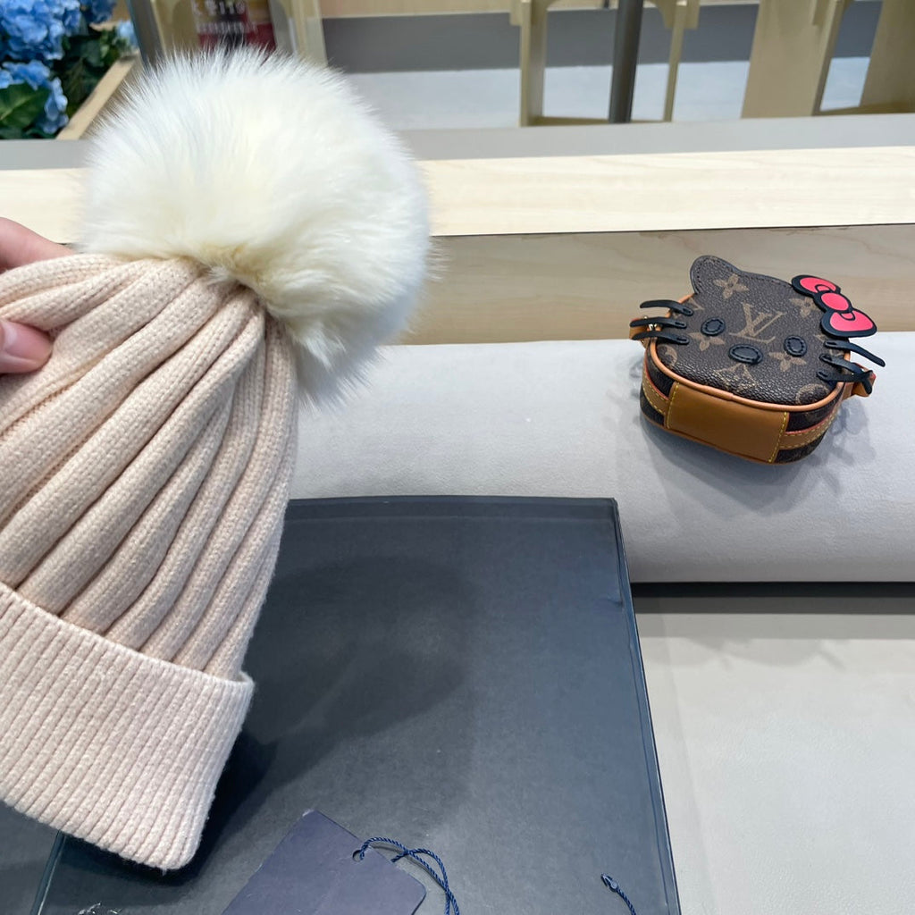 KNITTED BEANIE HAT IN LULLABY PINK WOOL AND FOX FUR 409792