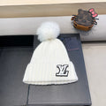 KNITTED BEANIE HAT IN WHITE WOOL 413368